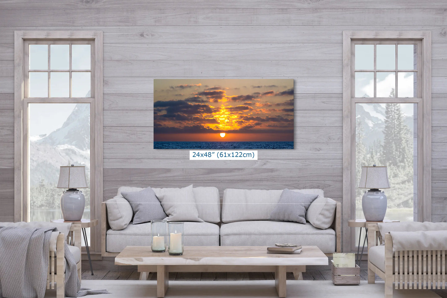 a living room filled with furniture and a painting on the wall