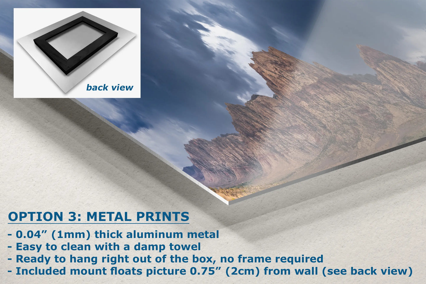 a picture of a mountain range under a cloudy sky