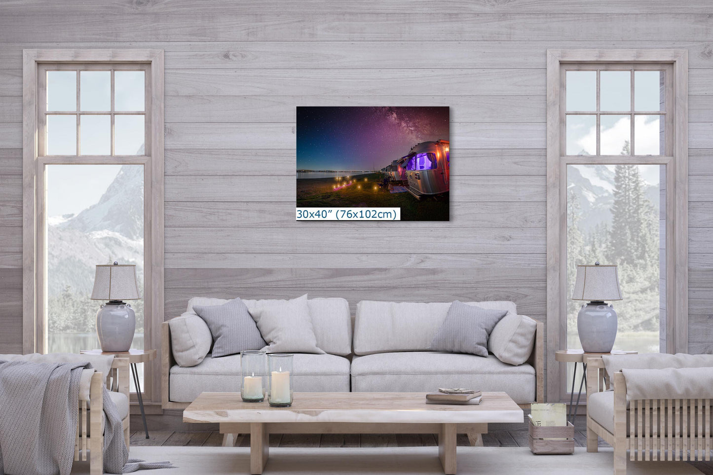 Living room wall art display featuring a 30x40-inch print of Airstream trailers at Mission Bay under the Milky Way.