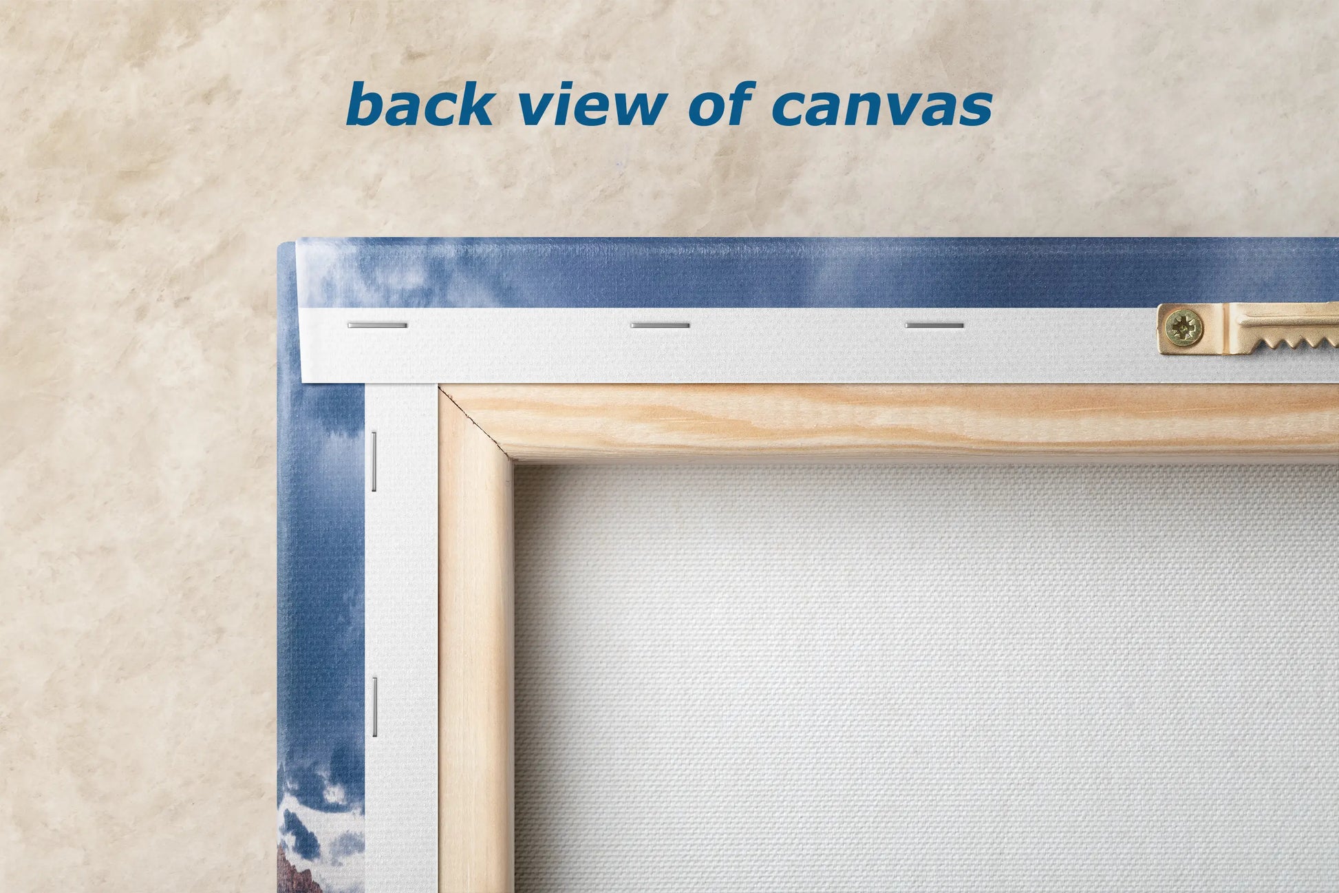 the back view of a canvas with a wooden frame