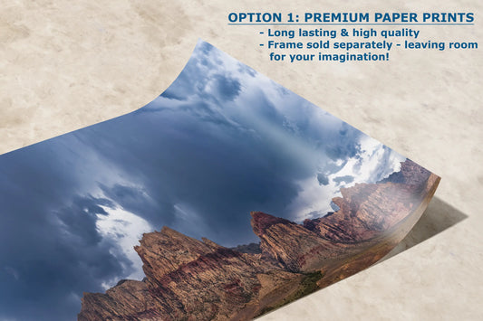 a picture of a mountain with clouds in the sky