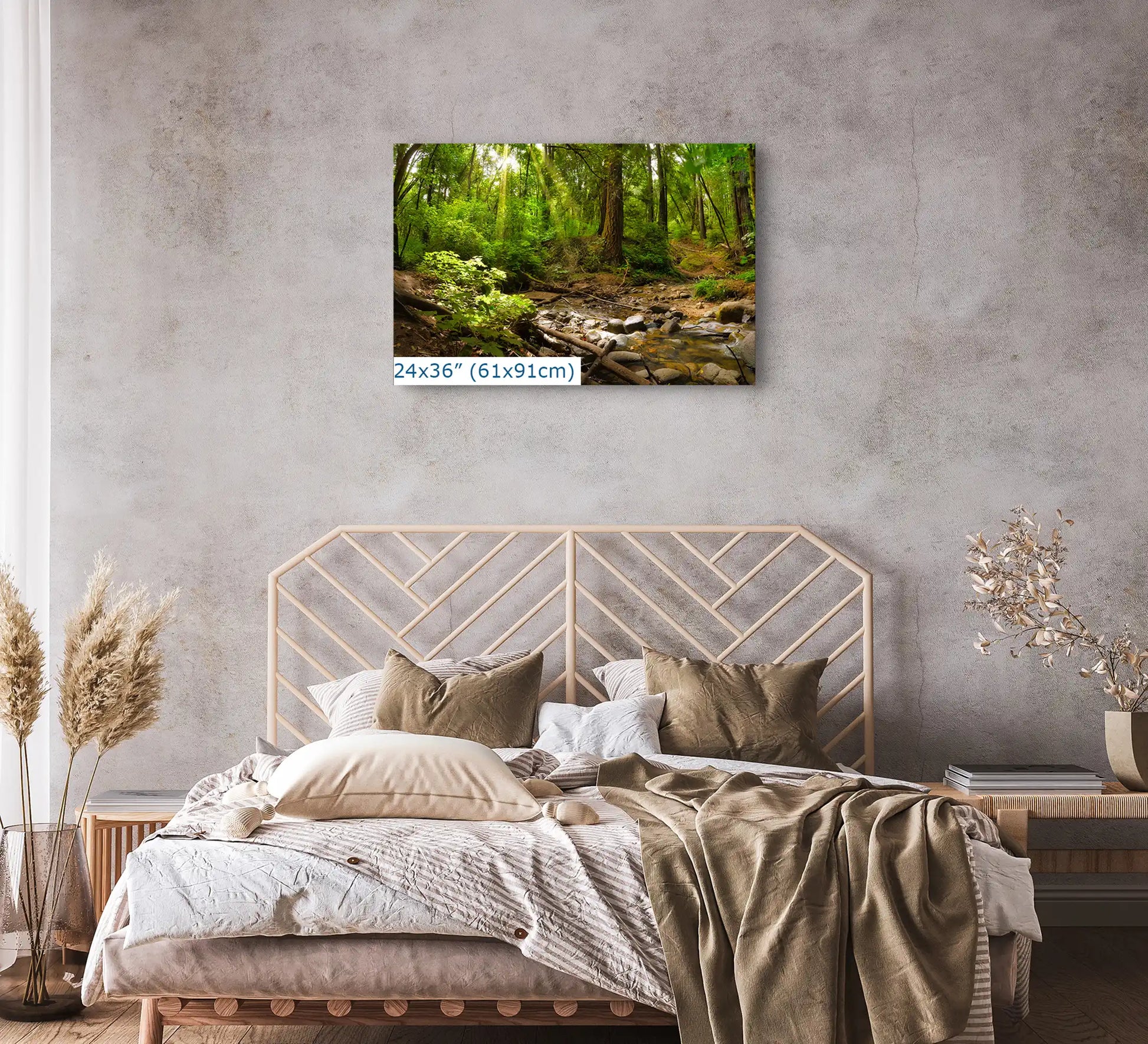 A large 24x36 inch wall art piece in a bedroom, featuring a serene forest with redwood trees and a gentle creek.