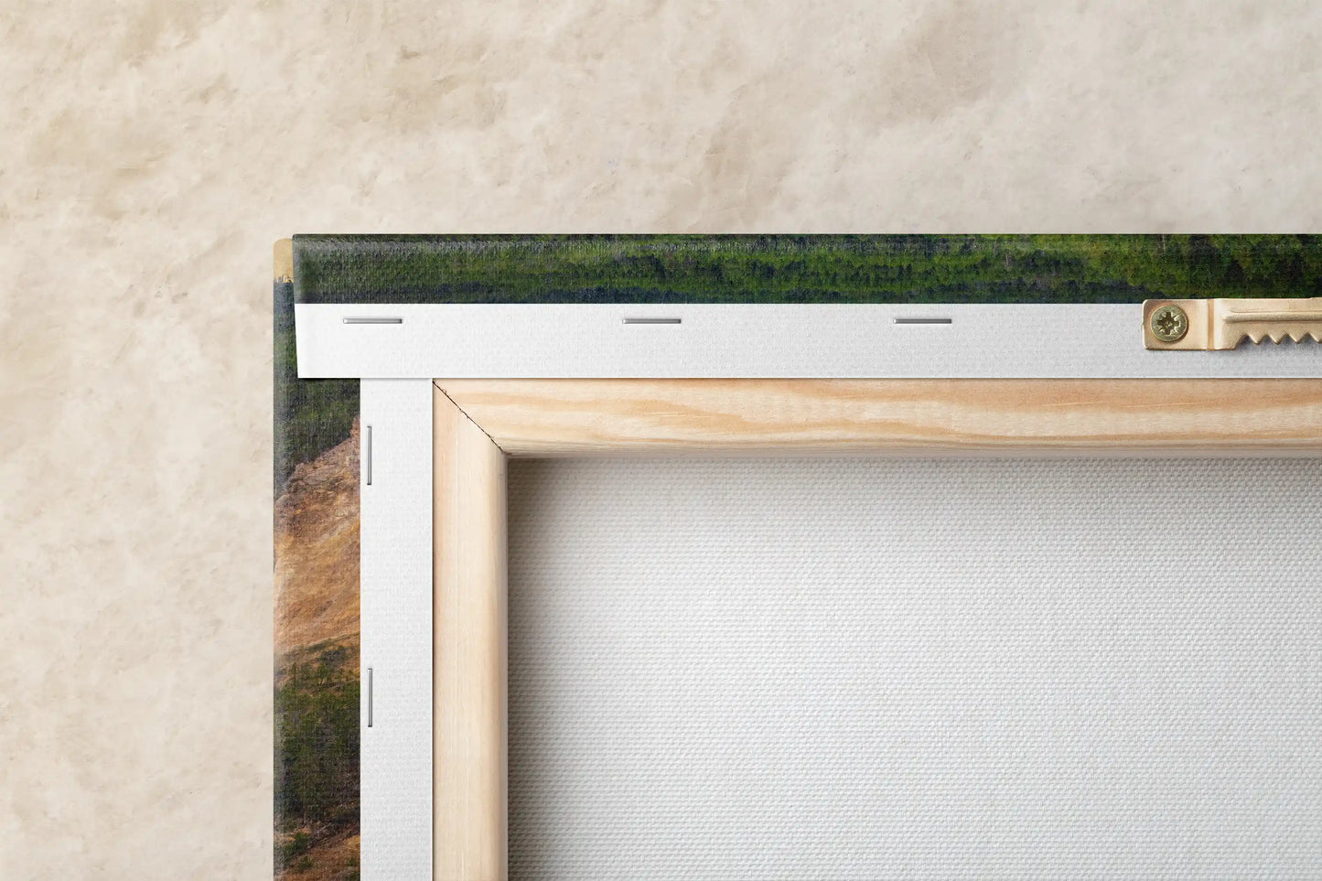 Close-up of a gallery-wrapped canvas wall art featuring a wide view of Lower Yellowstone Falls at sunset, showing vibrant colors and textures.