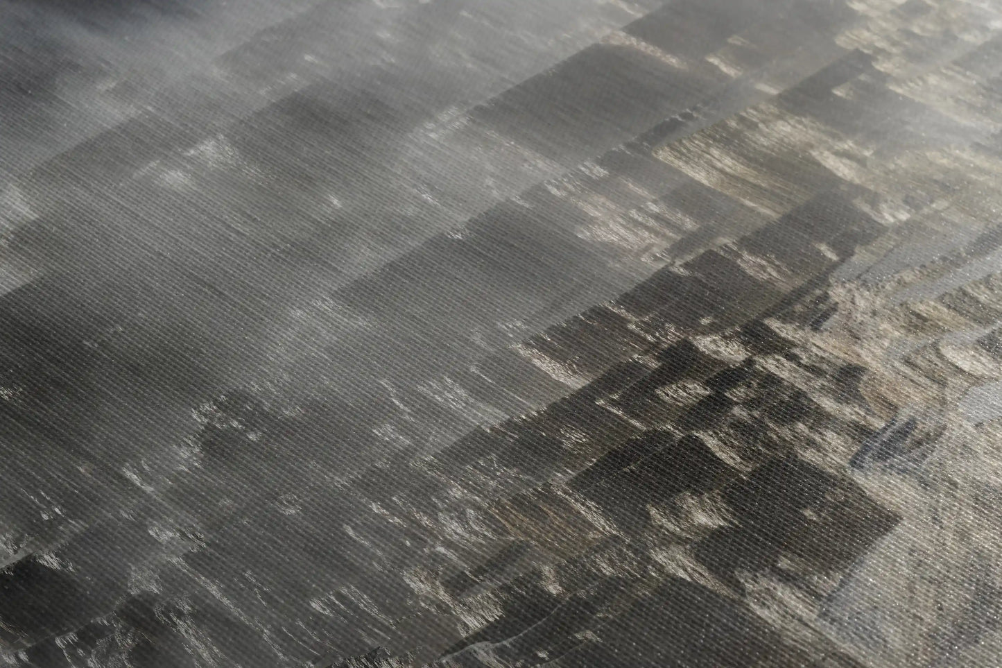 Textured close-up of canvas wall art depicting steamy Mammoth Hot Springs Terraces at Yellowstone.