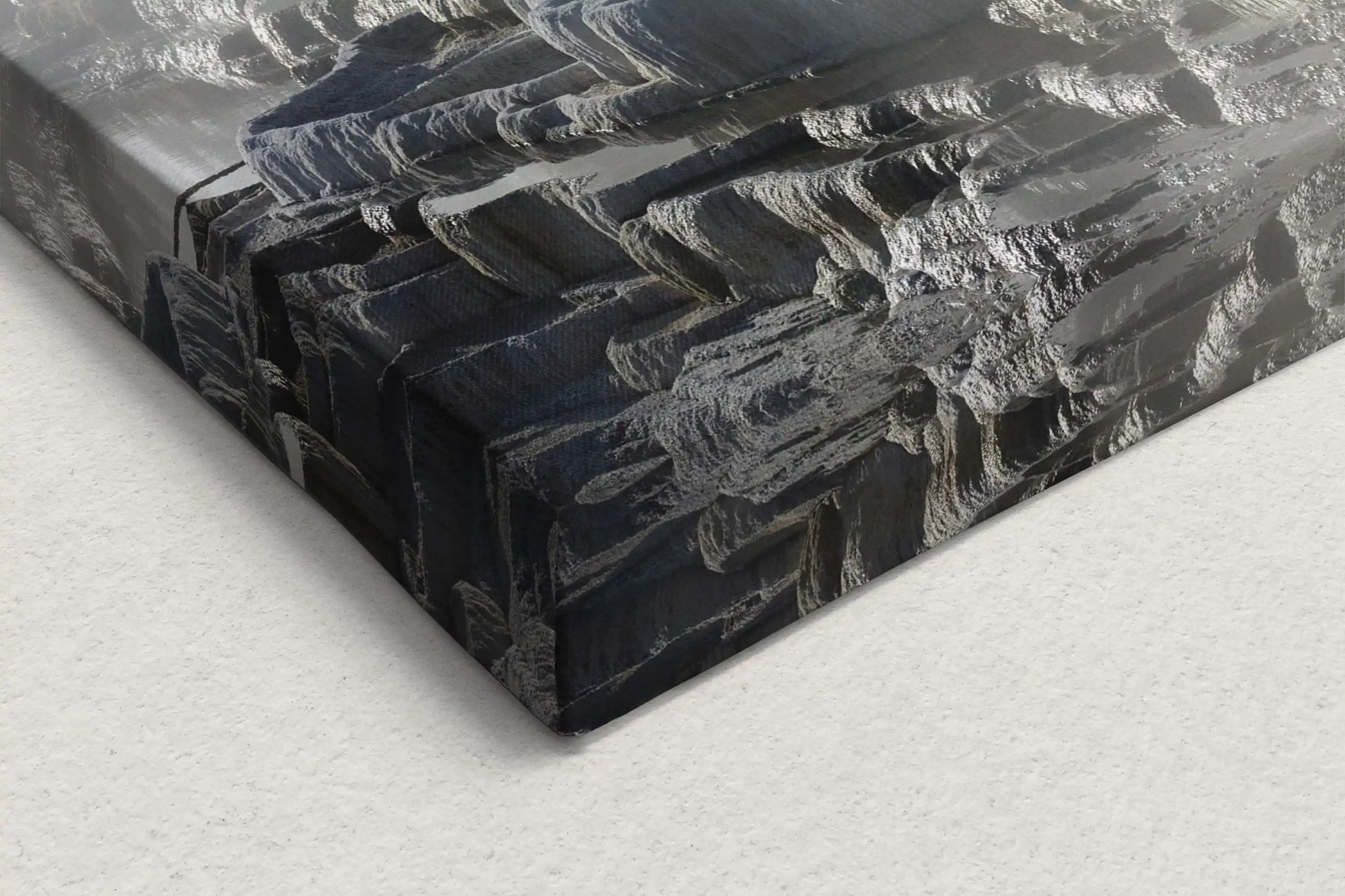 Detailed edge view of canvas wall art with Mammoth Hot Springs Terraces enshrouded in steam at Yellowstone.