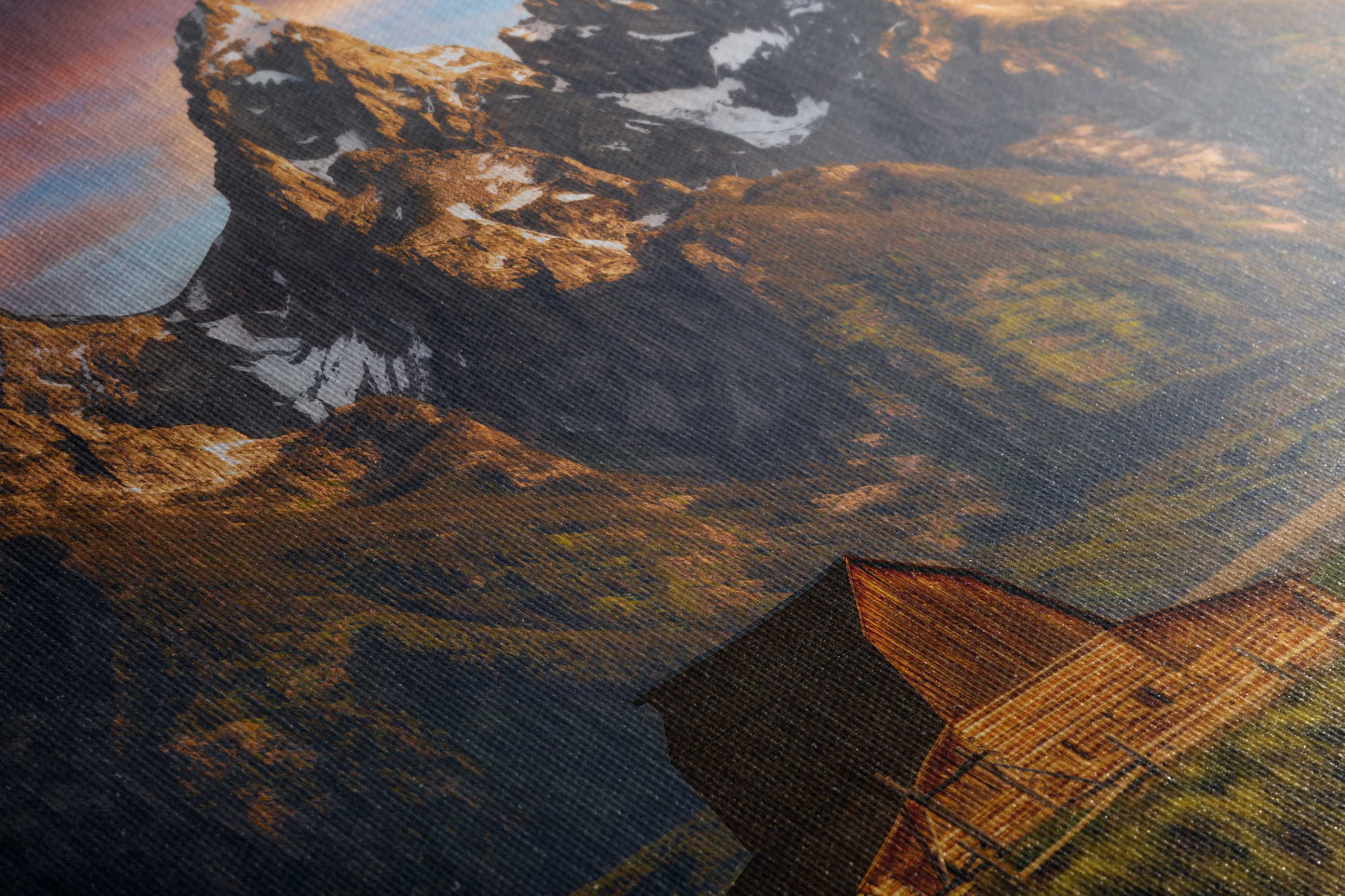 Close-up of a canvas print showing the textured detail of the John Moulton Homestead with the Teton Mountains in the background, capturing the essence of Grand Teton National Park.