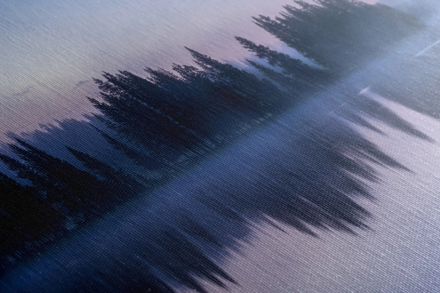 Close-up of canvas texture showing a vibrant sunrise over the Teton Mountains and Snake River, reflecting natural beauty and tranquility