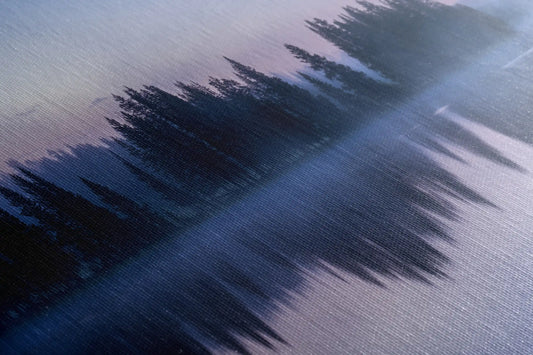 Close-up of canvas texture showing a vibrant sunrise over the Teton Mountains and Snake River, reflecting natural beauty and tranquility