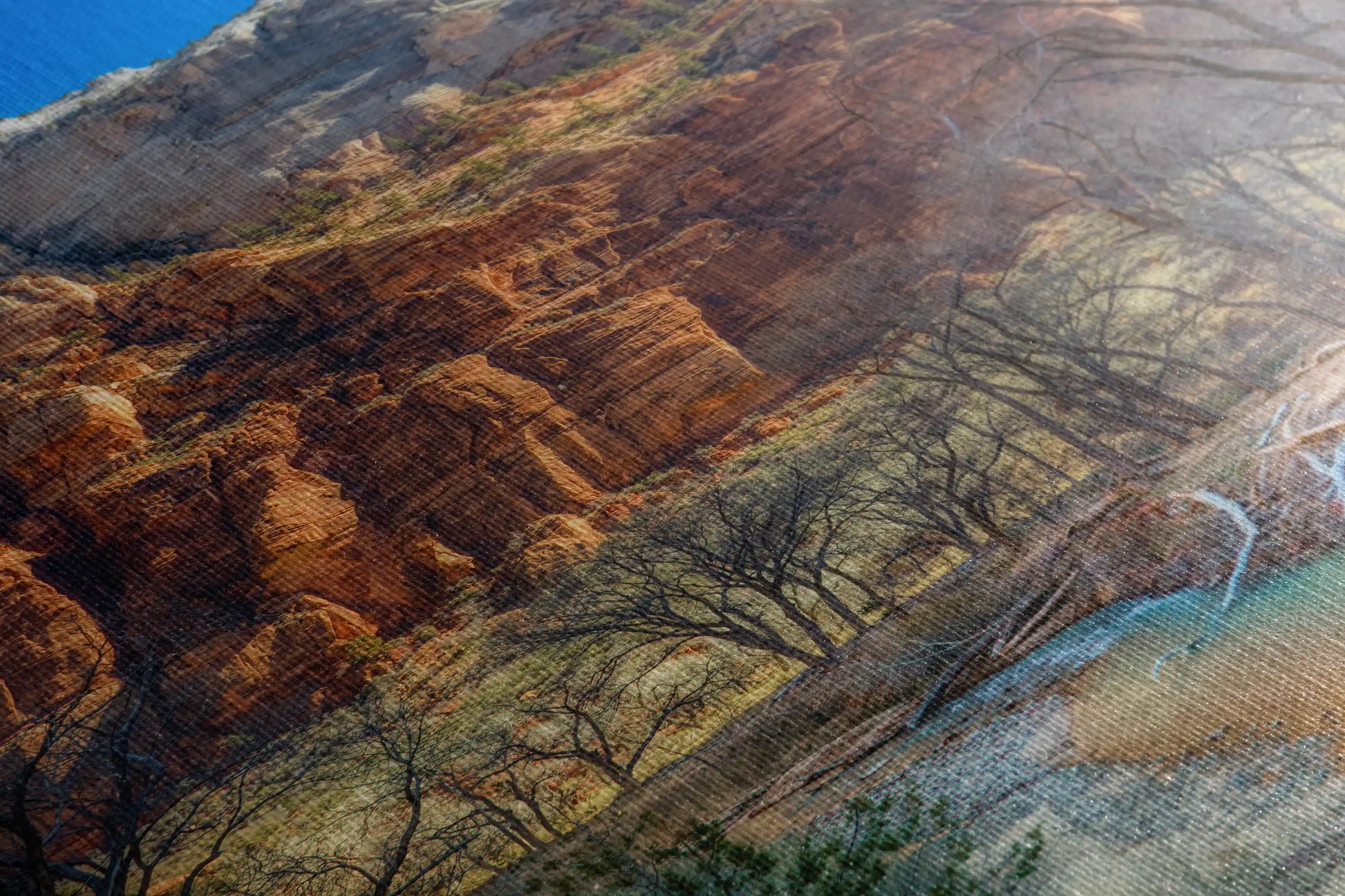 Close-up texture of a canvas print with the picturesque Zion Mountains, presenting the rugged landscape in stunning clarity and color.