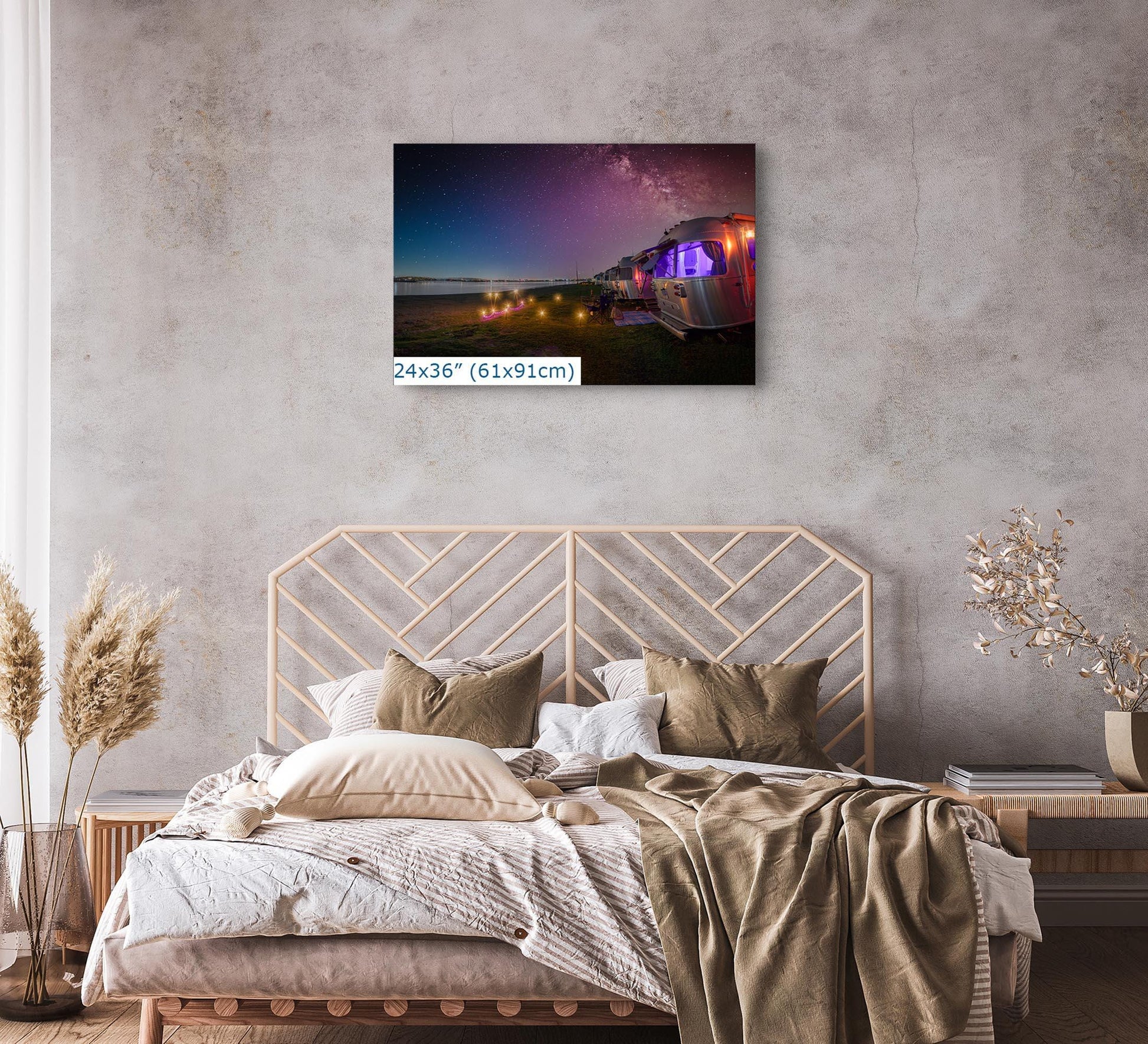 Bedroom wall art display featuring a 24x36-inch print of Airstream trailers near Mission Bay, with the Milky Way overhead.