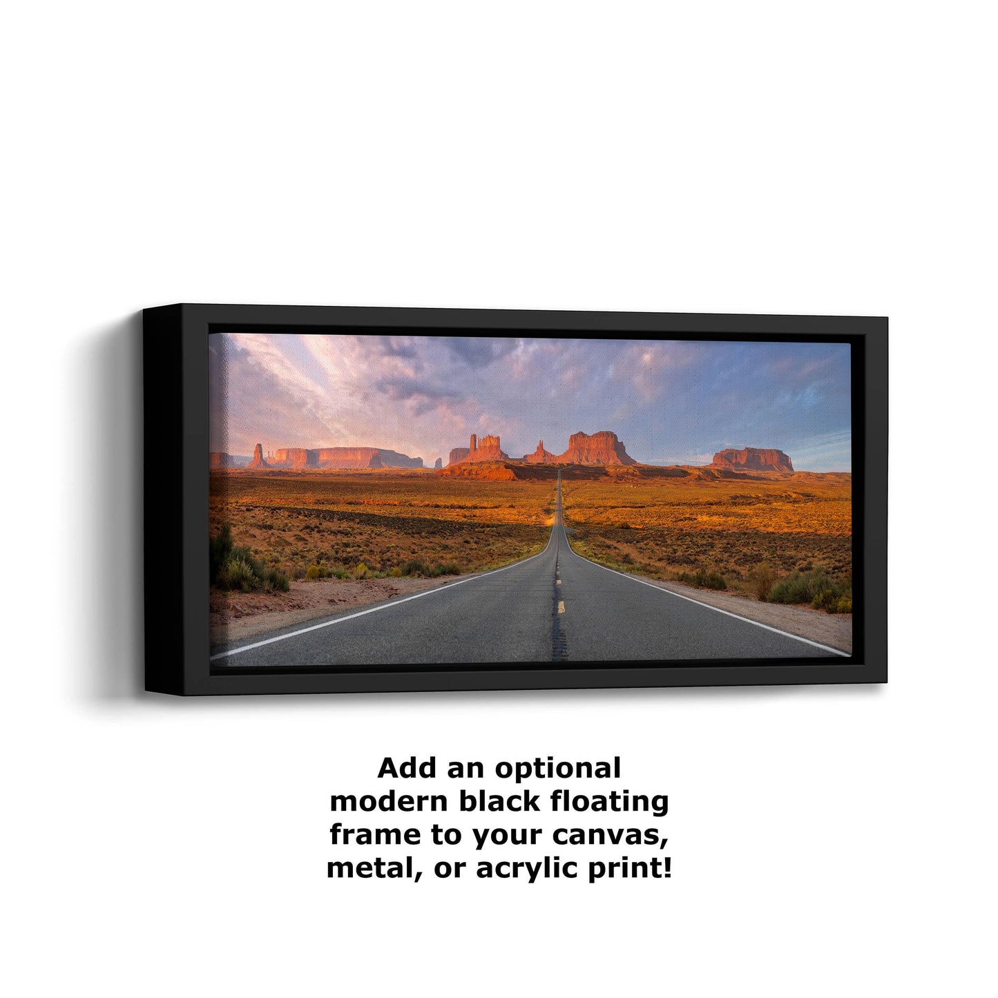 a picture of a desert with a road going through it