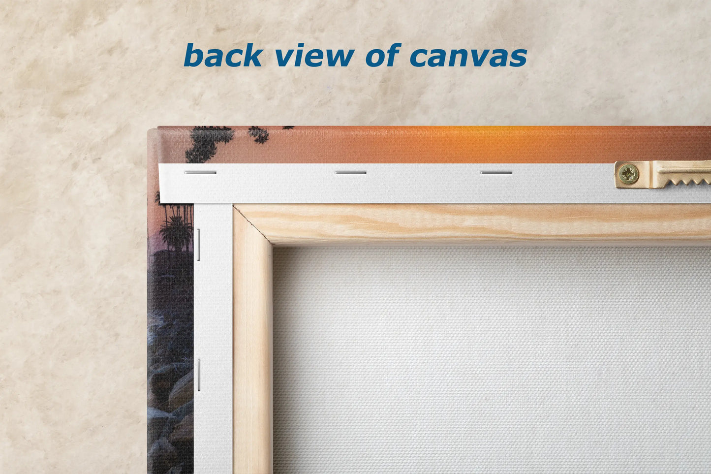 the back view of canvass is shown with a wooden frame