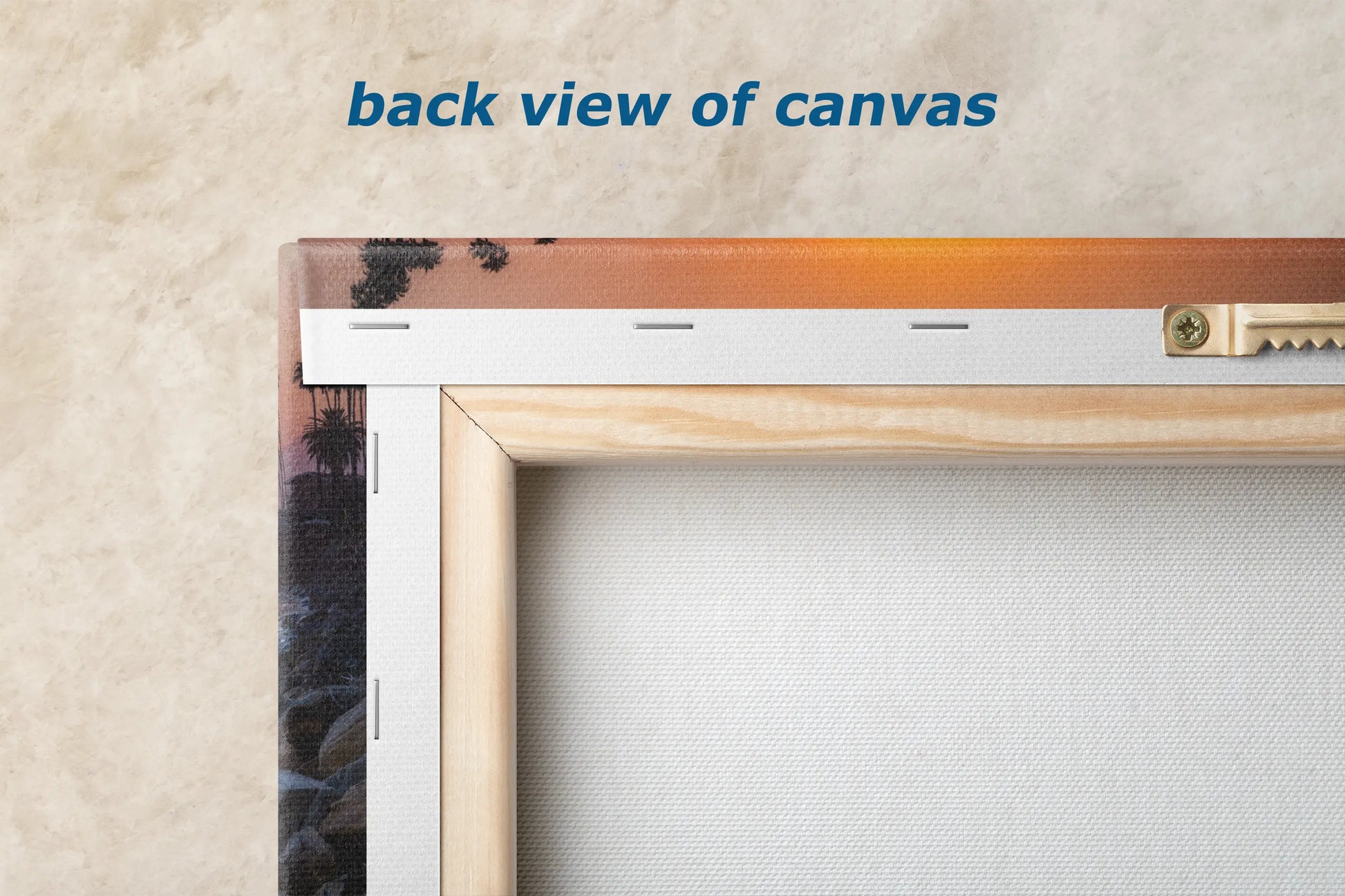 the back view of canvass is shown with a wooden frame
