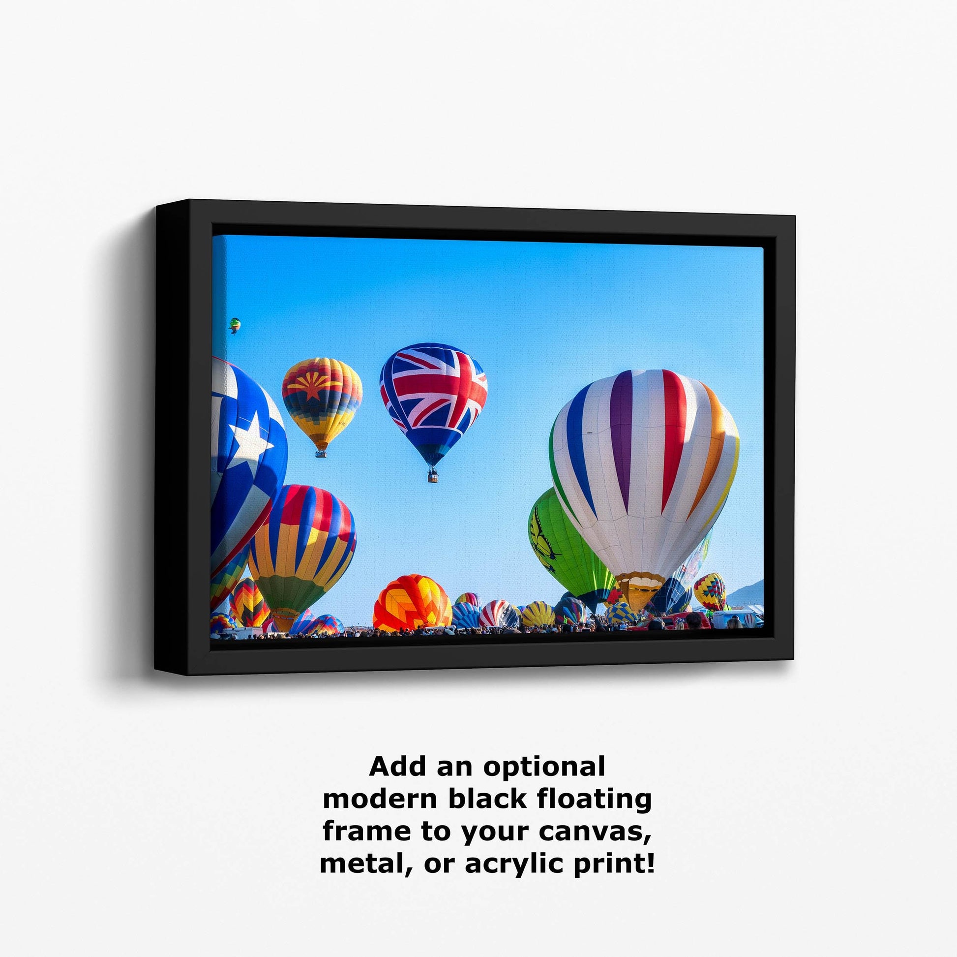 a group of hot air balloons flying in the sky