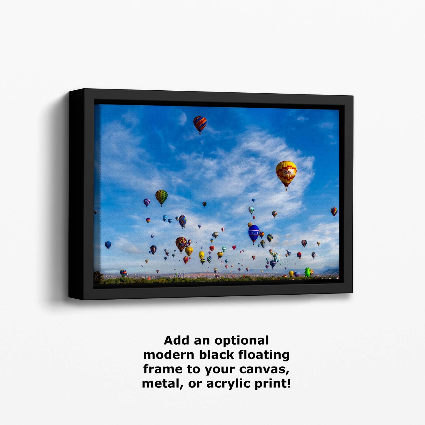 a group of hot air balloons flying in the sky