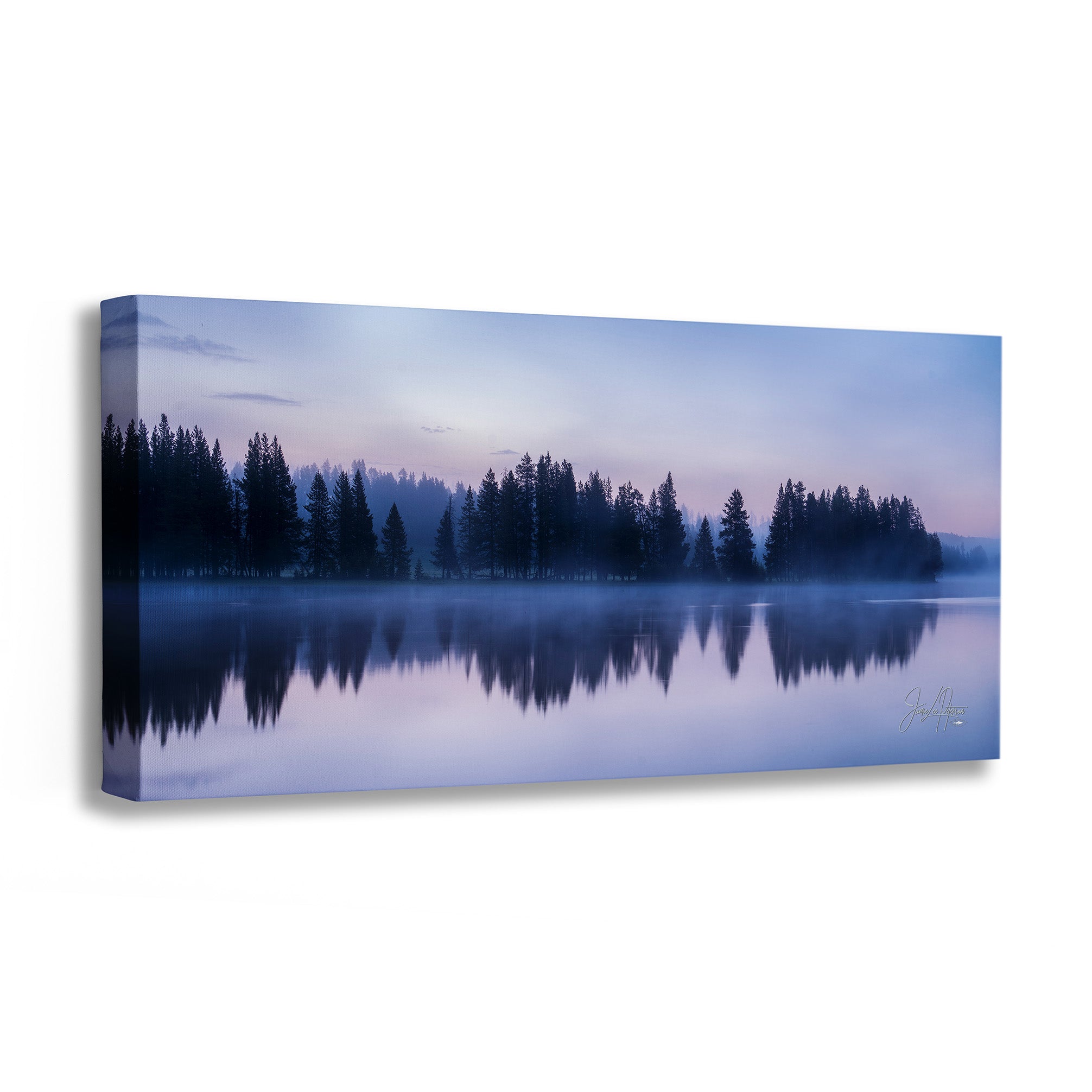 Canvas print of a serene lake scene with trees at dusk.