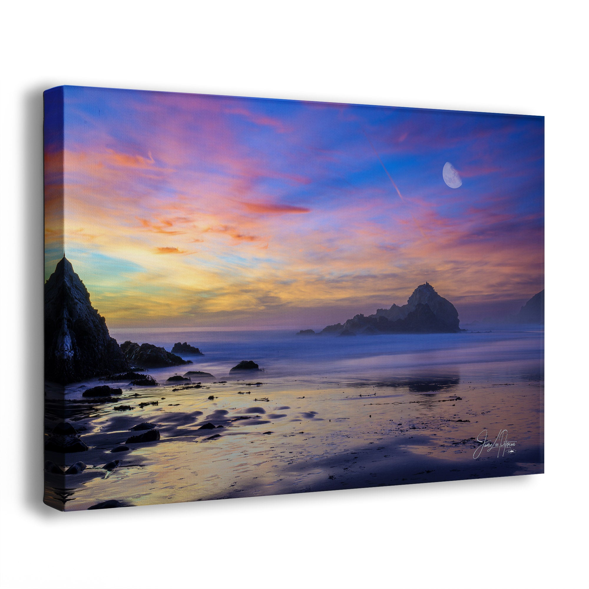 Canvas print of a Big Sur, California, purple sand beach scene with a colorful sunset sky and moon.