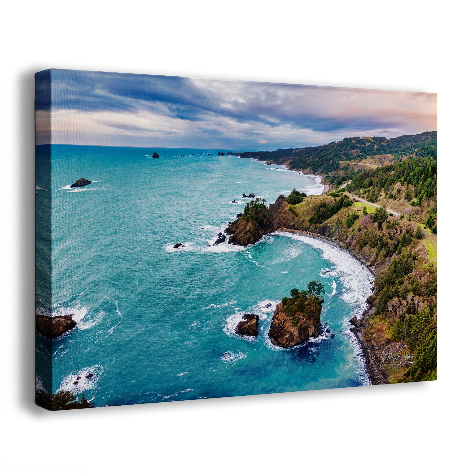 Canvas print of a coastal landscape with blue ocean and green cliffs.