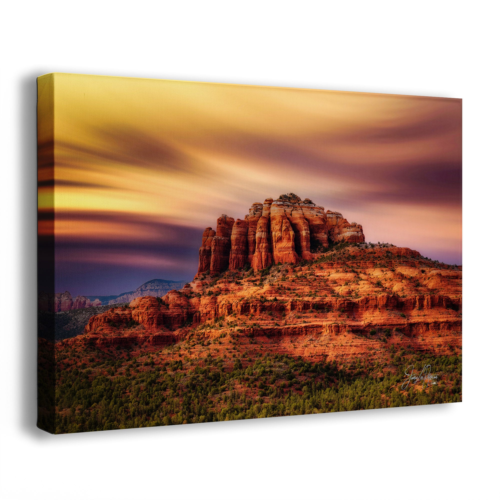 A canvas wall art print showing a Sedona, Arizona, desert rock formation at sunset, photographed against a plain white background with a slight drop shadow.