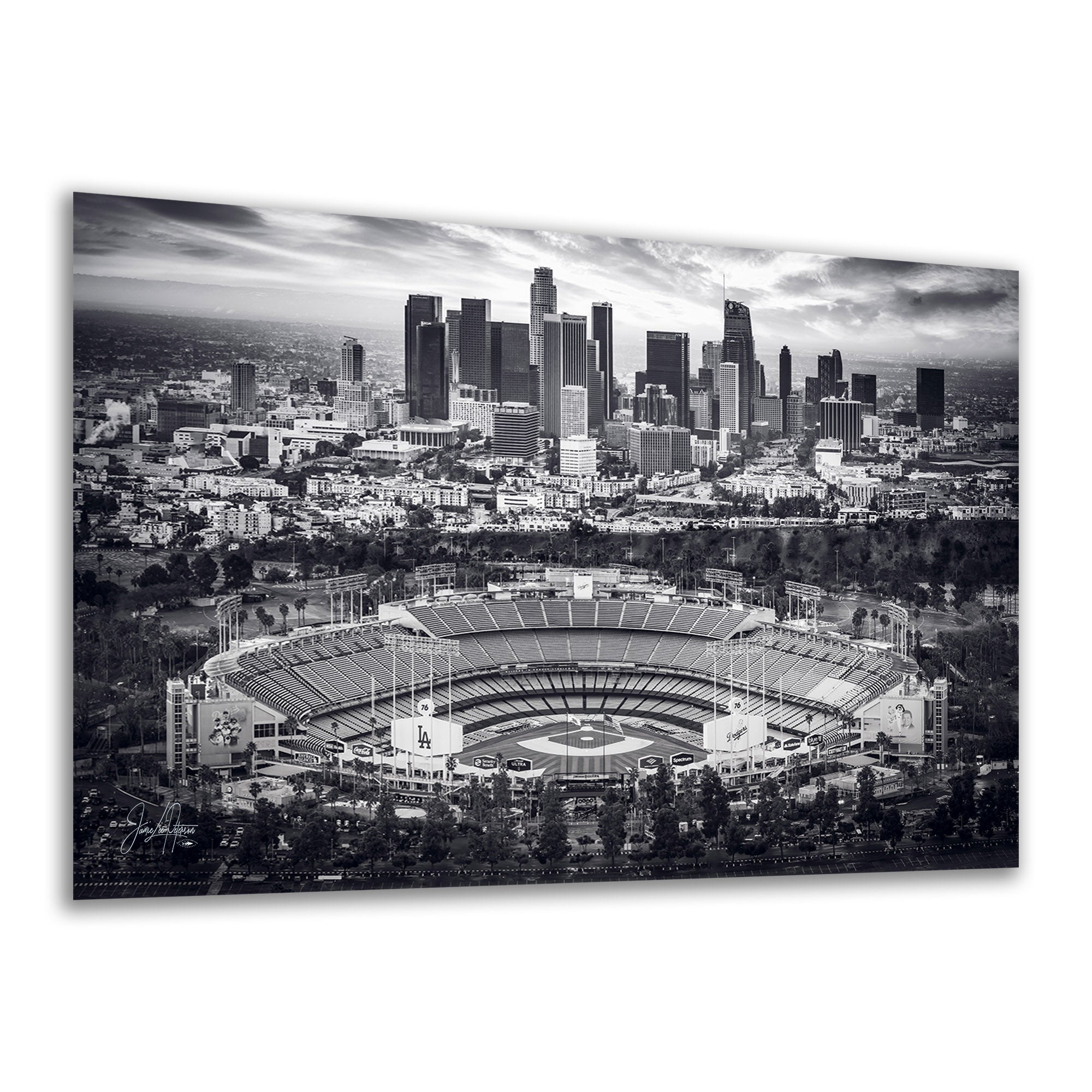 A black and white Los Angeles Dodgers Stadium Artwork panoramic photograph of the LA skyline, featuring the cityscape and stadium in the foreground, shown as a rectangular wall art print with a slight drop shadow on a white background.
