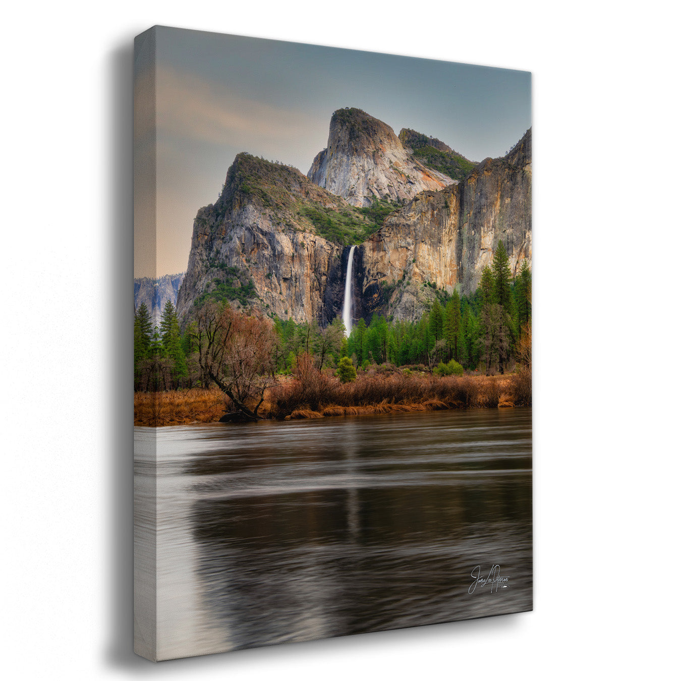 Canvas print of a mountain landscape with a waterfall and reflection in water.