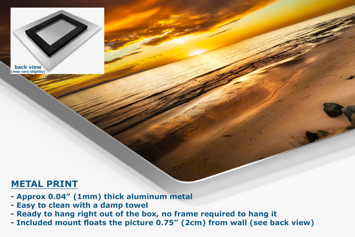 A metal wall art print showing a beach sunset scene, with a small inset showing the back view of the frameless print. Text on the image highlights the aluminum metal finish and mounting details.