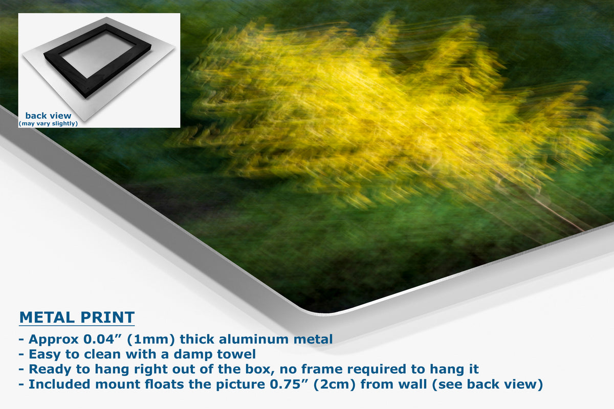 A metal wall art print shown at an angle with a back-view inset and descriptive text. The artwork features an abstract blurred scene with bright yellow and green tones on a dark background.