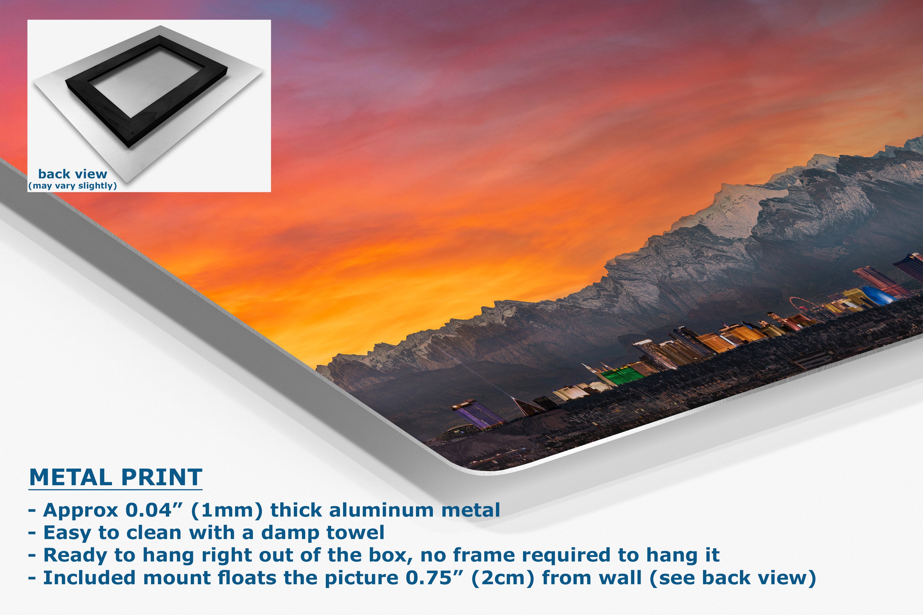 A metal wall art print showing a dramatic mountain landscape at sunset, presented at an angle with product details and text on a white background. Includes a small inset showing the back view of the frame mount.
