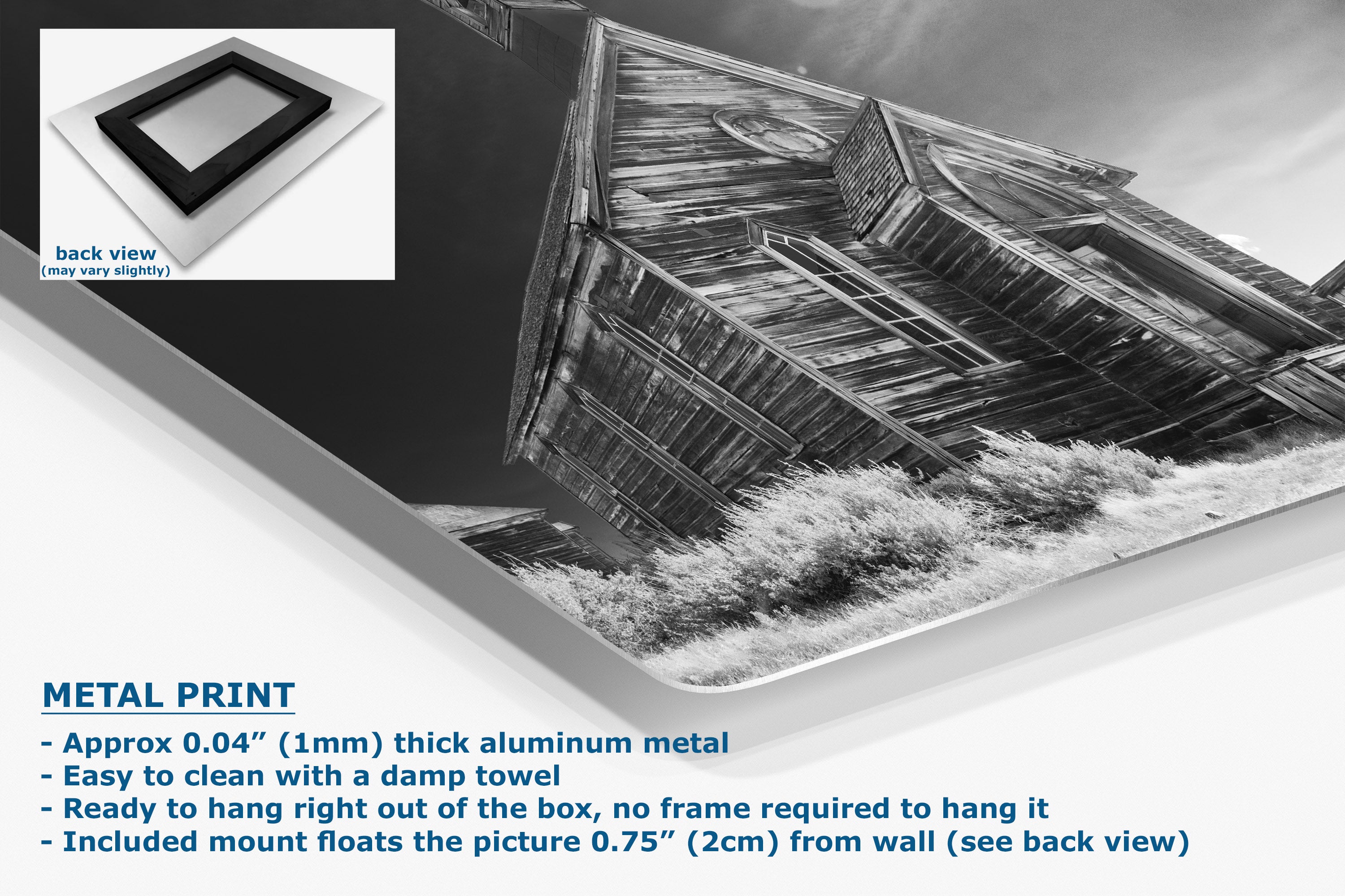 A corner view of an aluminum metal art print depicting an old, weathered wooden building, displayed at an angle, with product specifications and a small back-view inset on a white background.