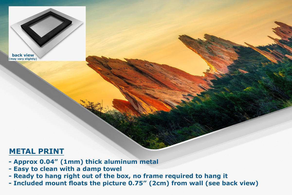 A corner view of an aluminum metal print of a landscape with a mountain and sunset, featuring text about the product.
