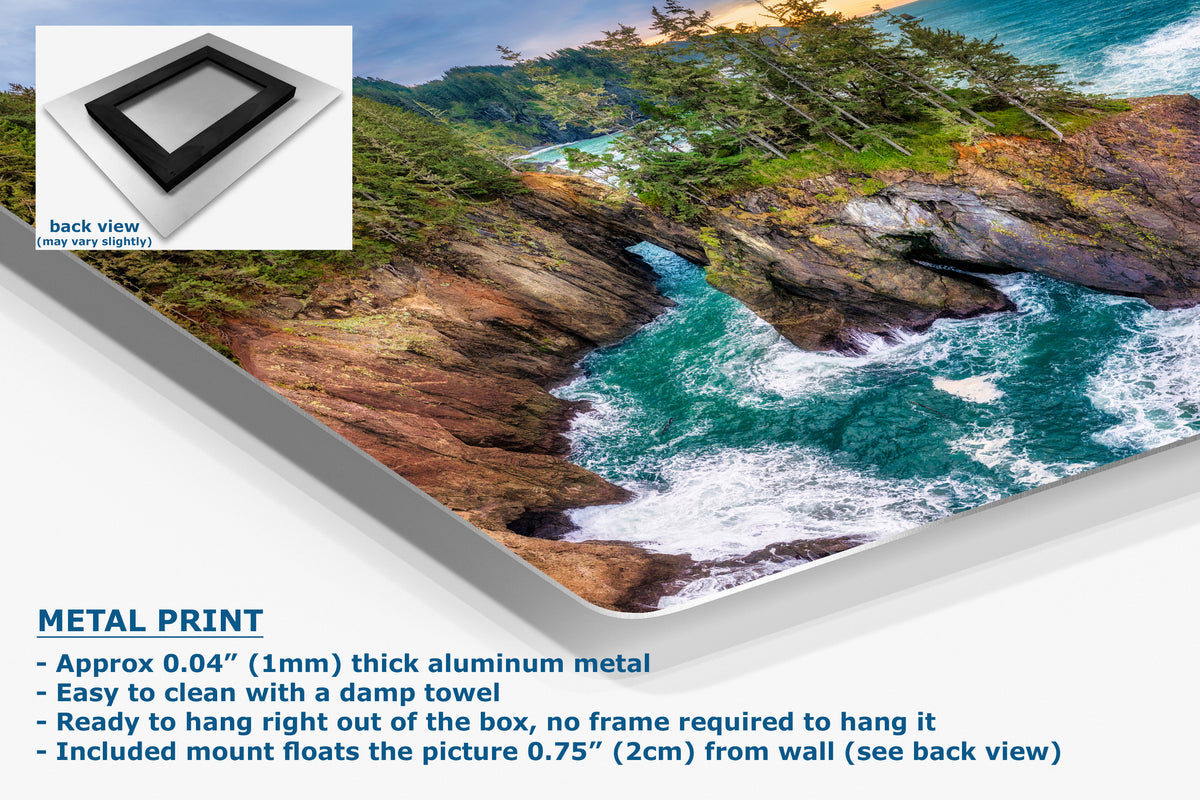 A large metal print panel showing a coastal landscape with turquoise water, rocky cliffs, and green trees, presented at an angle on a white background. A small inset shows the back view of the frame.