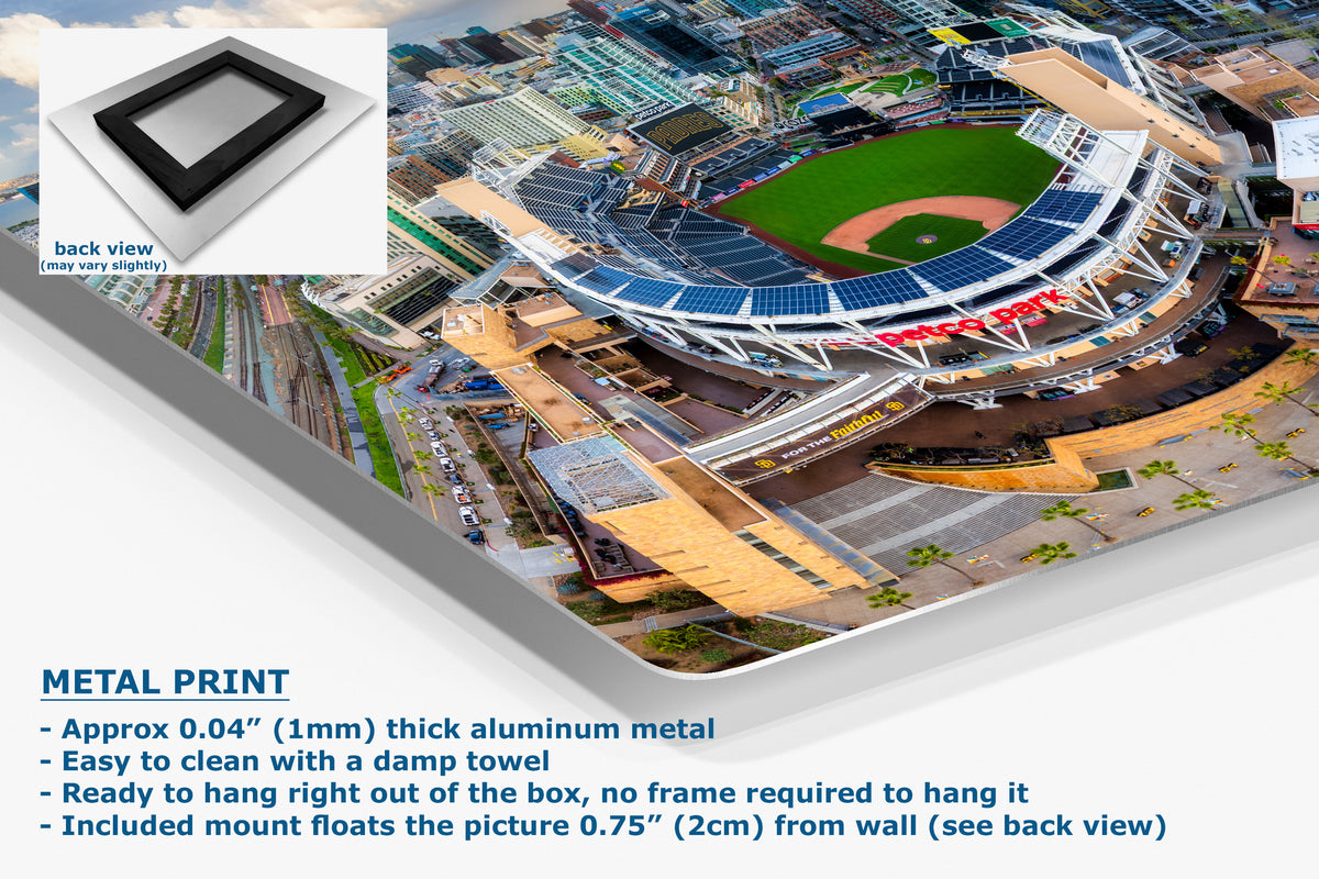 A corner view of an aluminum metal wall art print of a stadium scene with text callouts and a small inset showing the back view of the mounting frame. The image explains that this is a metal print product rather than a plain product photo, but it is still primarily showing the product itself rather than a measurement chart, color swatch, or instruction diagram.