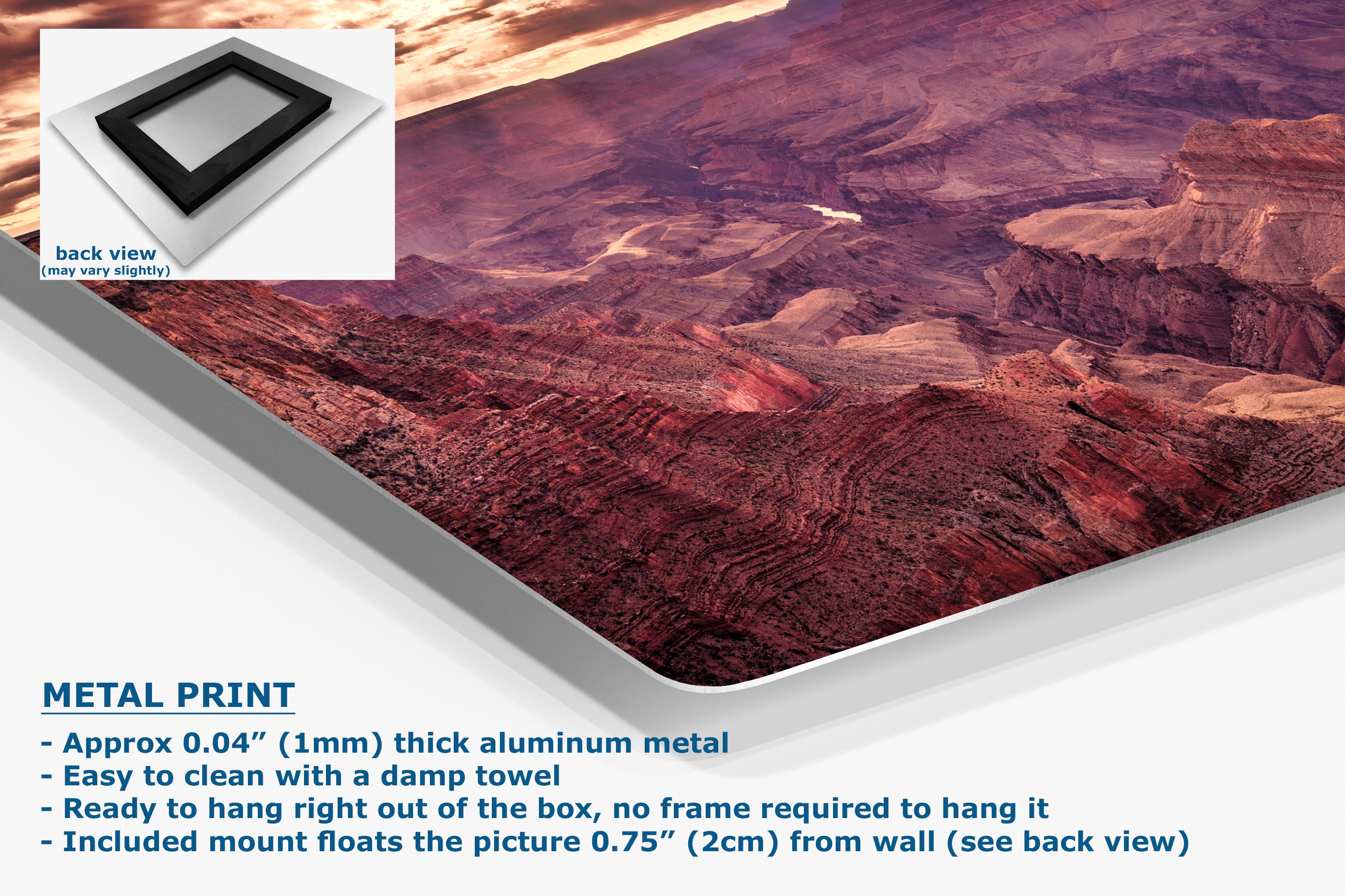 A large rectangular metal wall art print showing a canyon landscape in reddish-brown and purple tones, displayed at an angle with a small inset showing the back view of the frame mount. Text on the image reads 'METAL PRINT' and lists product details.