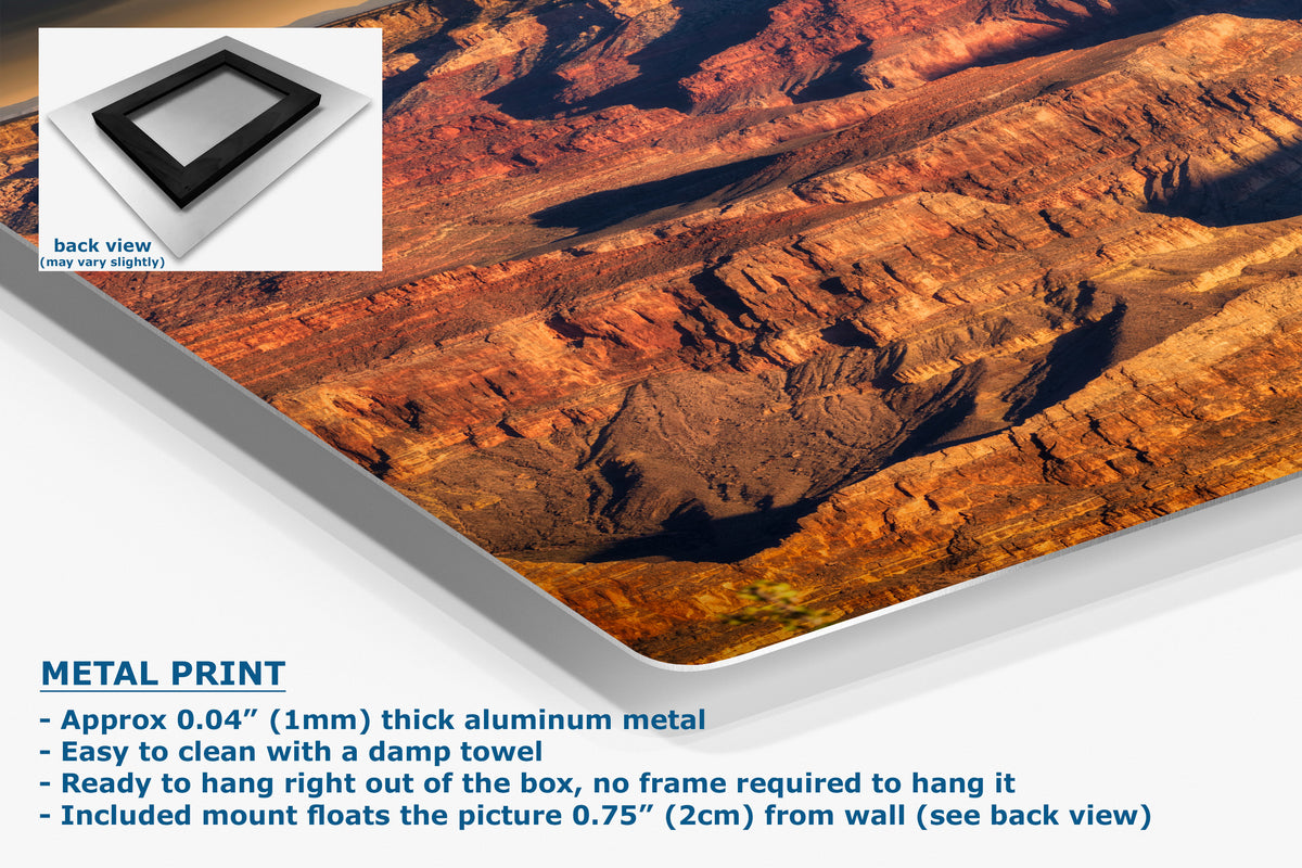A metal print poster of a canyon landscape, shown at an angle with product details and text overlays on a white background.