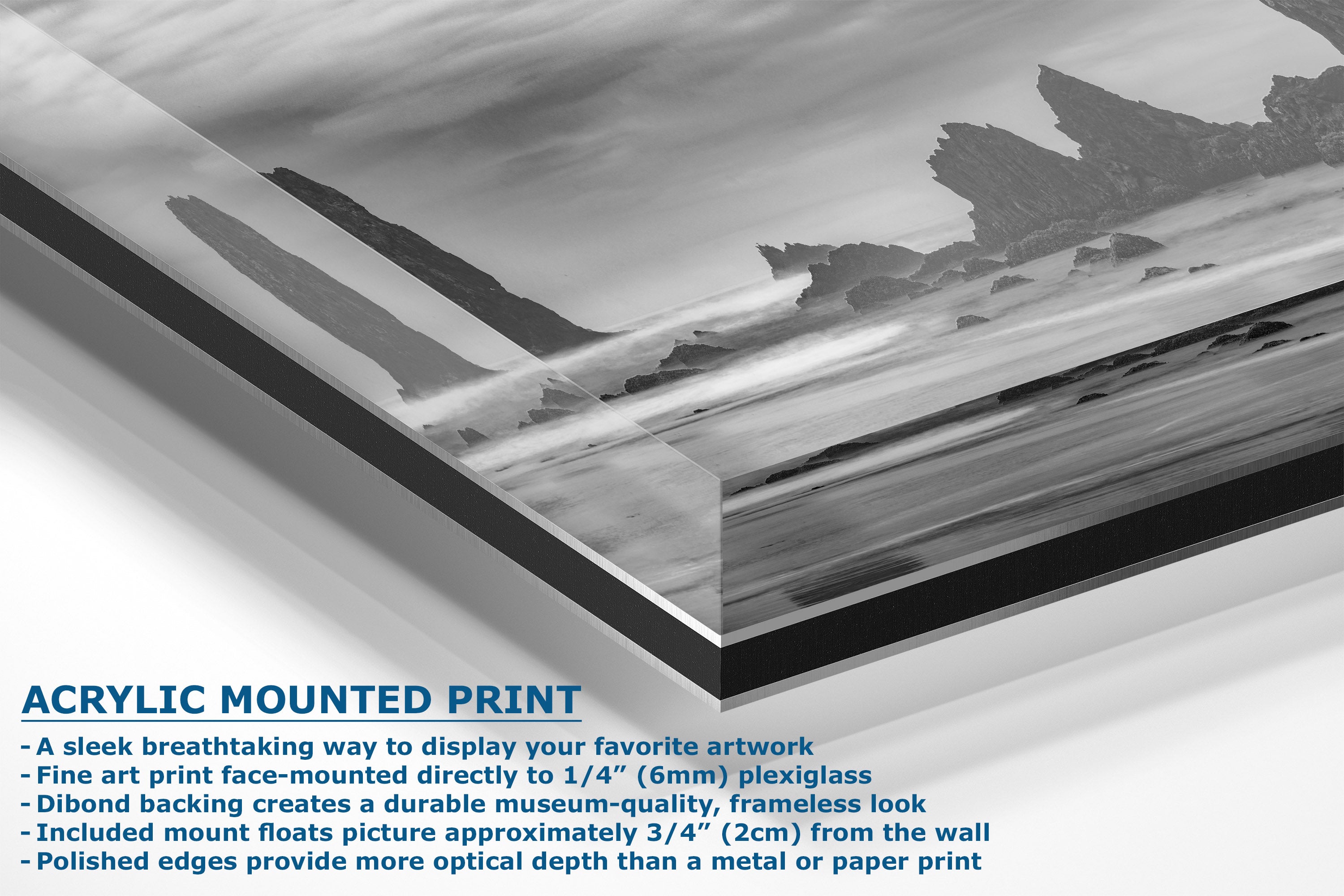 Acrylic mounted art print featuring a black and white landscape photograph of mountains, shown at an angle with descriptive text overlays on a white background.