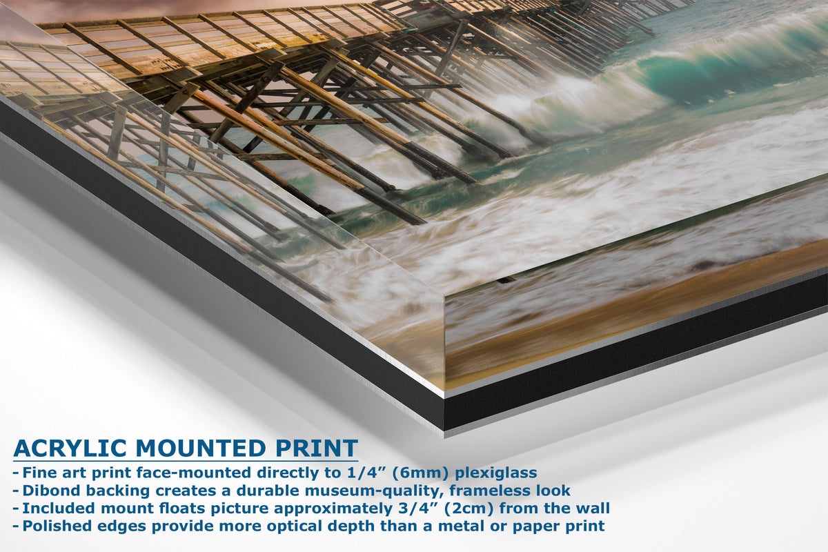 Acrylic mounted art print of a wooden pier and ocean waves, shown at an angle with descriptive text on a white background.