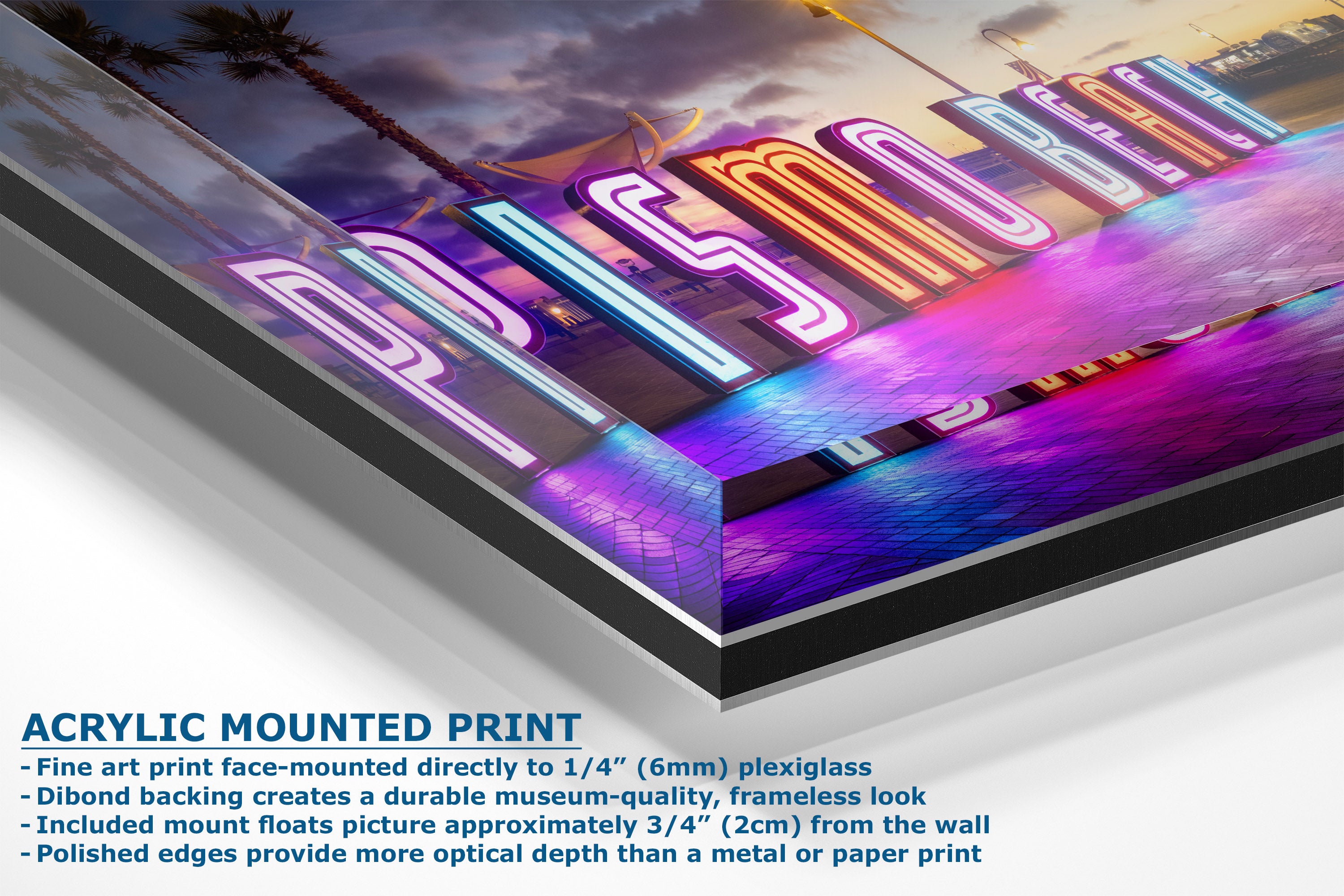 A corner view of an acrylic-mounted art print of a neon sign reading 'Pismo Beach' under a sunset sky, shown at an angle with product details and text callouts on a white background.