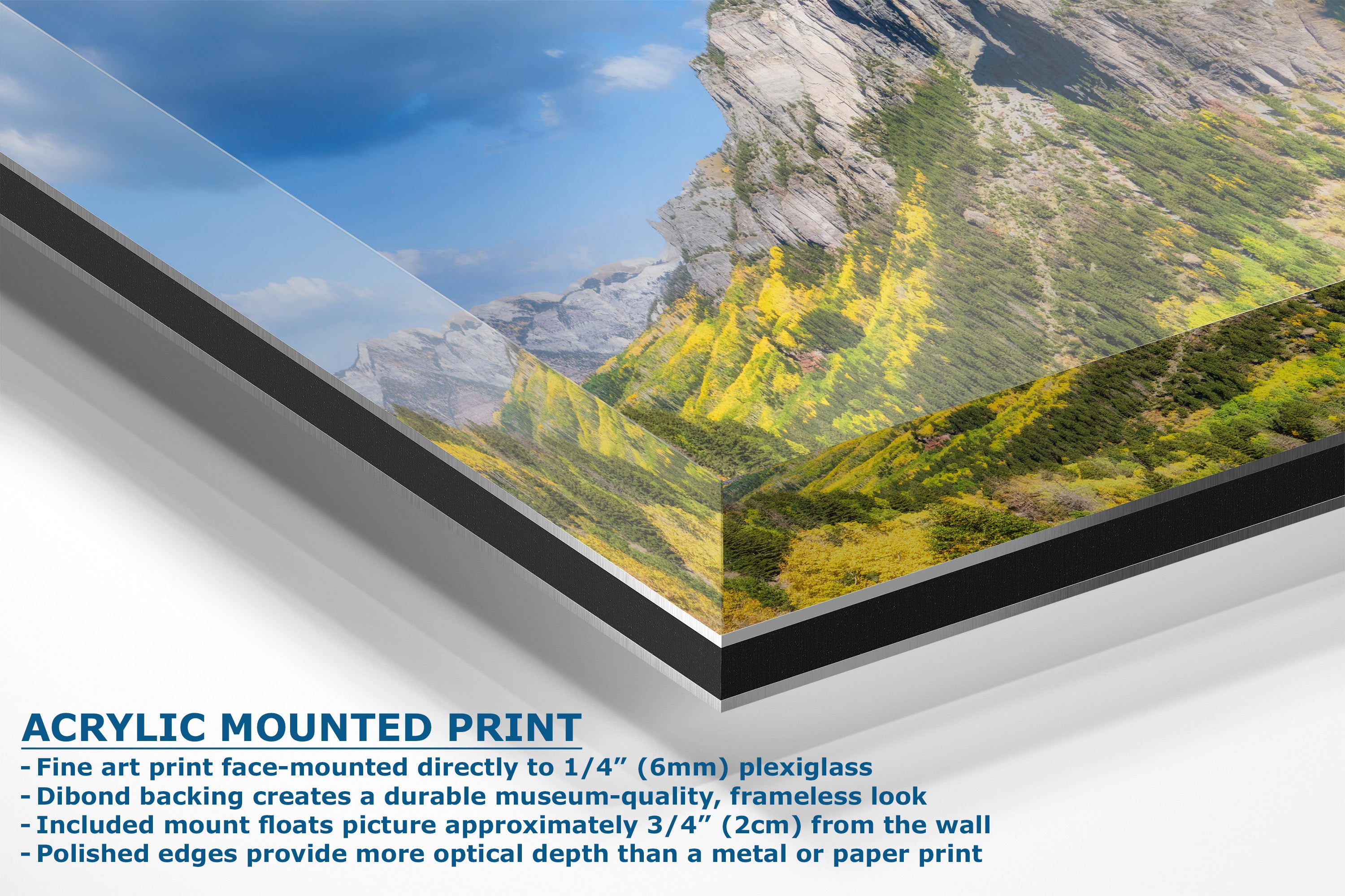 Acrylic mounted print of a mountain landscape with blue sky, shown at an angle with descriptive text on a white background.