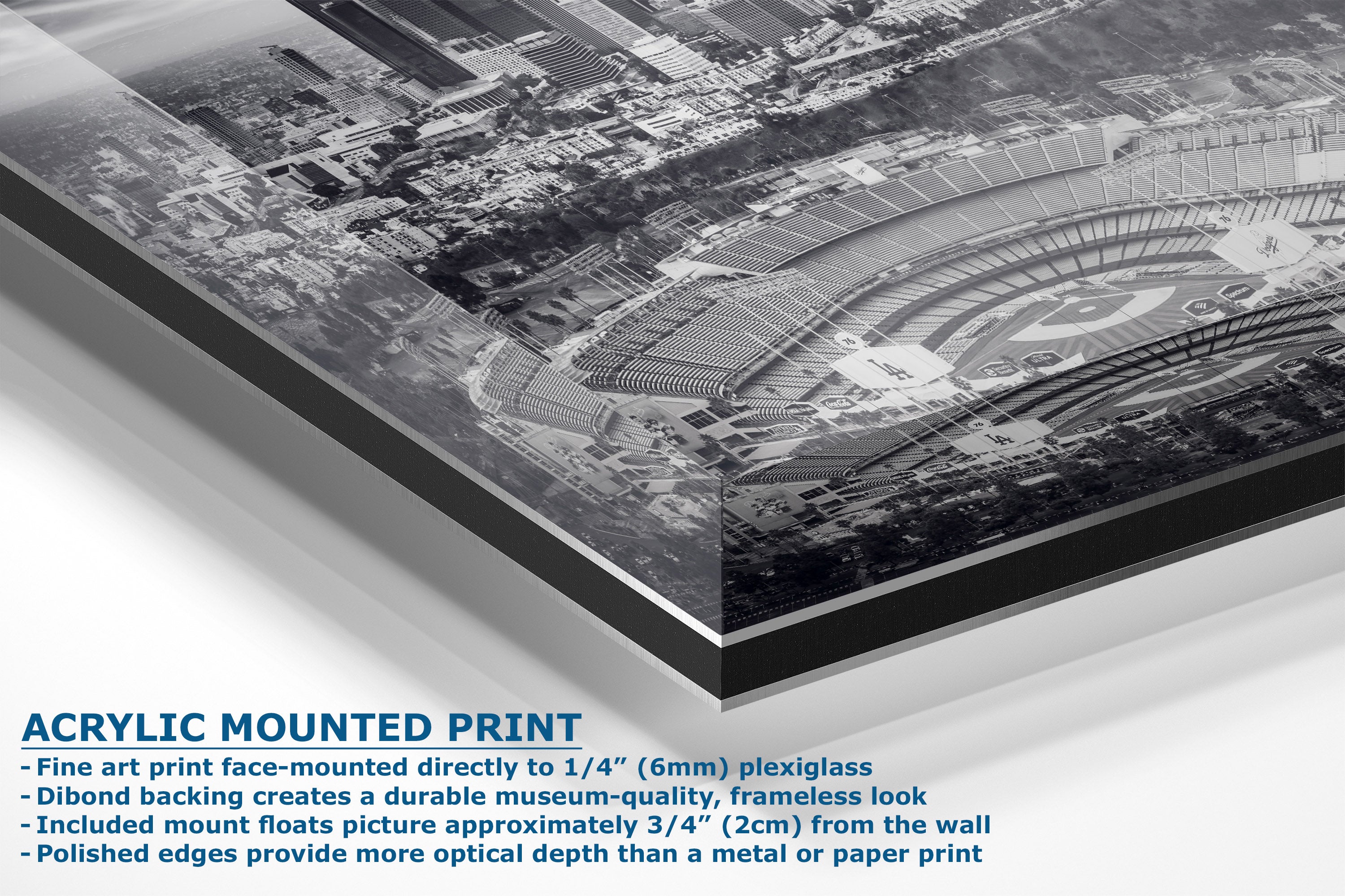 Acrylic mounted art print of a black and white aerial photograph of a stadium, shown at an angle with descriptive text on a white background.