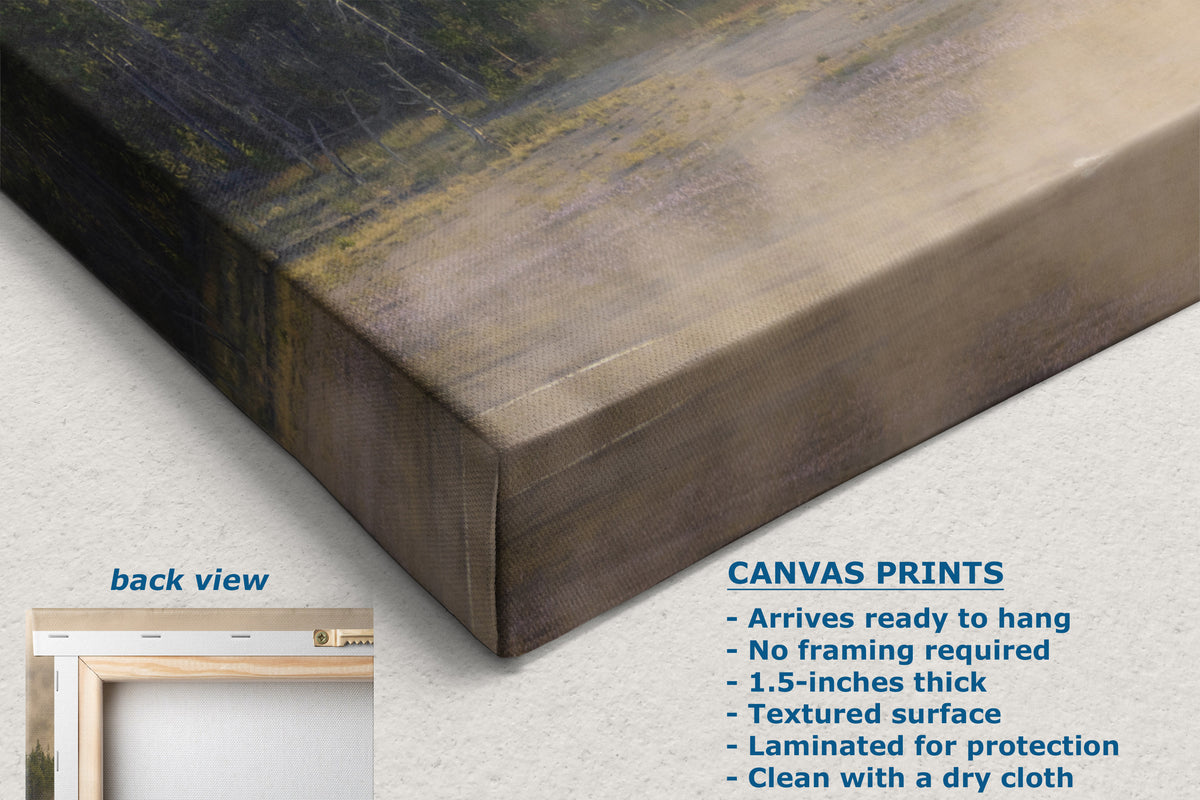 A canvas print of an abstract landscape painting shown at an angle, highlighting its wrapped edge. The canvas features dark green, brown, and beige tones.