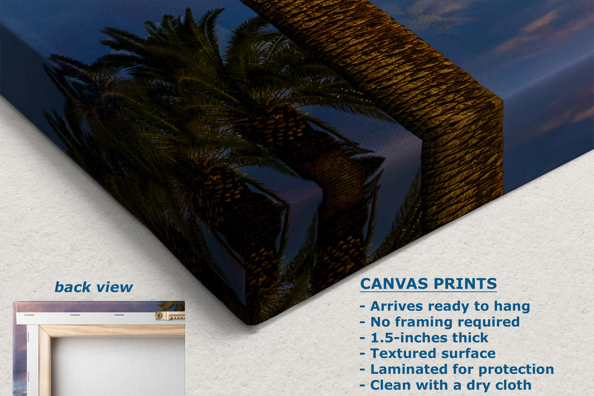 A corner view of a canvas wall art print shown at an angle with a palm tree and blue sky reflection, plus text describing the print features and a small back view inset on a light textured background.
