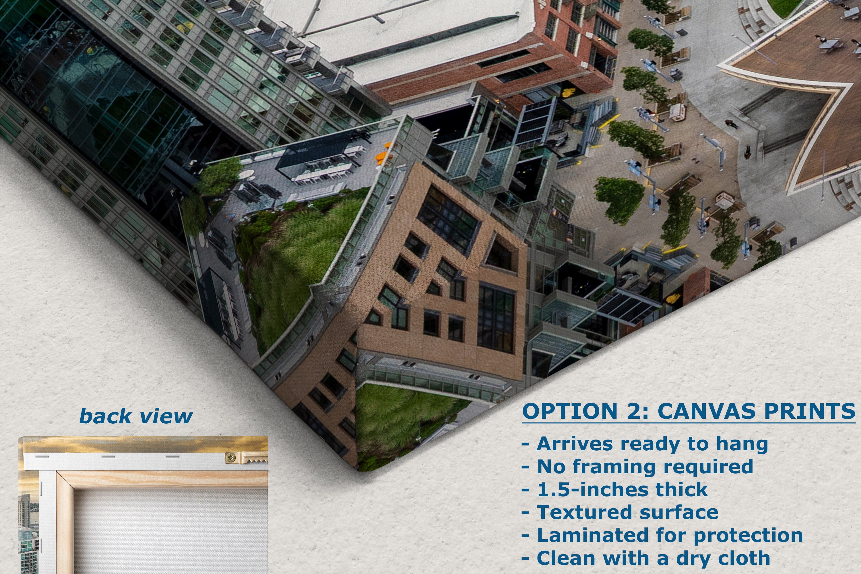 A promotional graphic for canvas wall art showing an aerial-style printed scene of modern buildings with green rooftops. The image includes text describing the print option and features, plus a small inset labeled back view showing a framed edge.