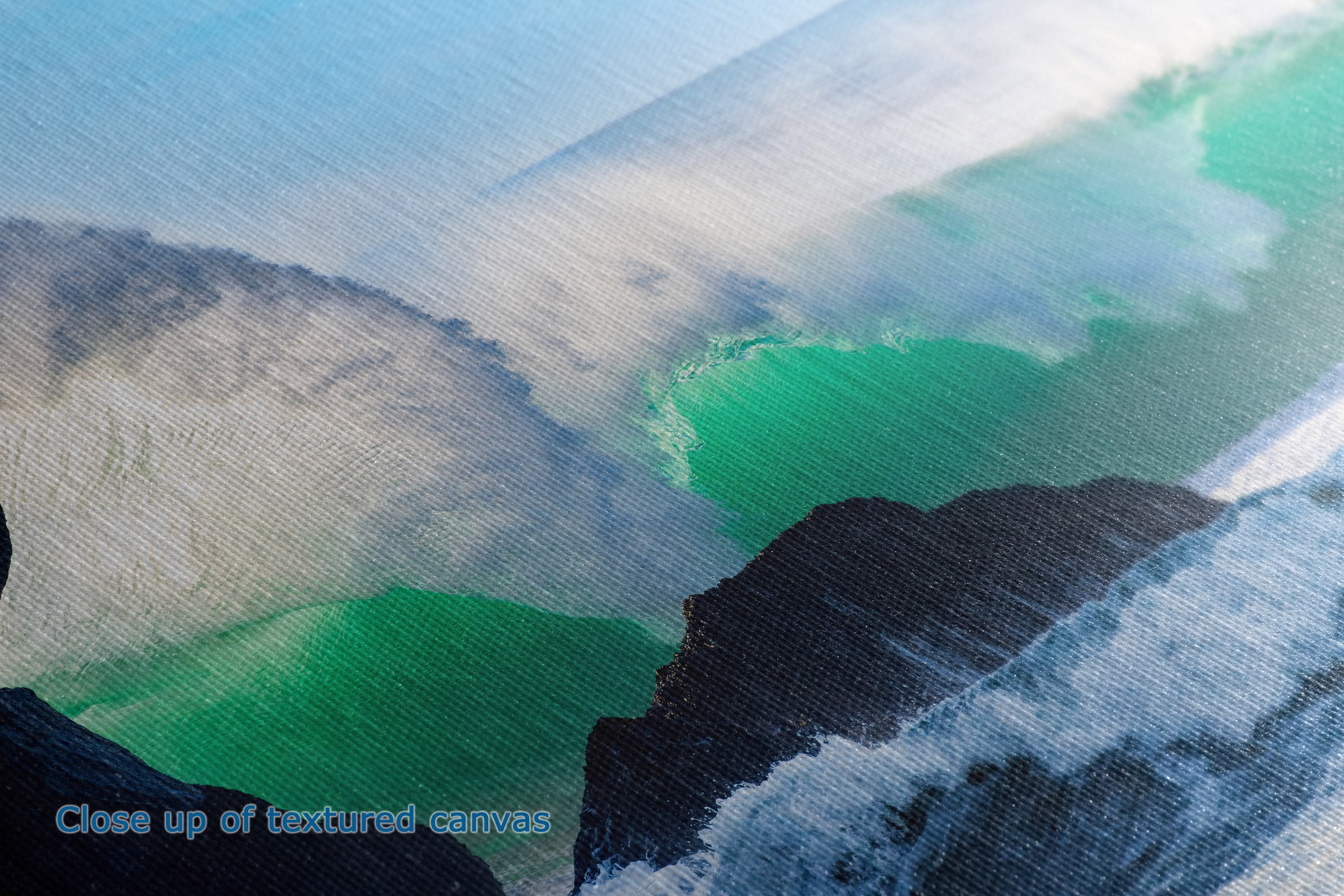 Close-up of a textured canvas painting depicting an ocean wave with green and turquoise water, white foam, and dark rocky cliffs under a pale sky.
