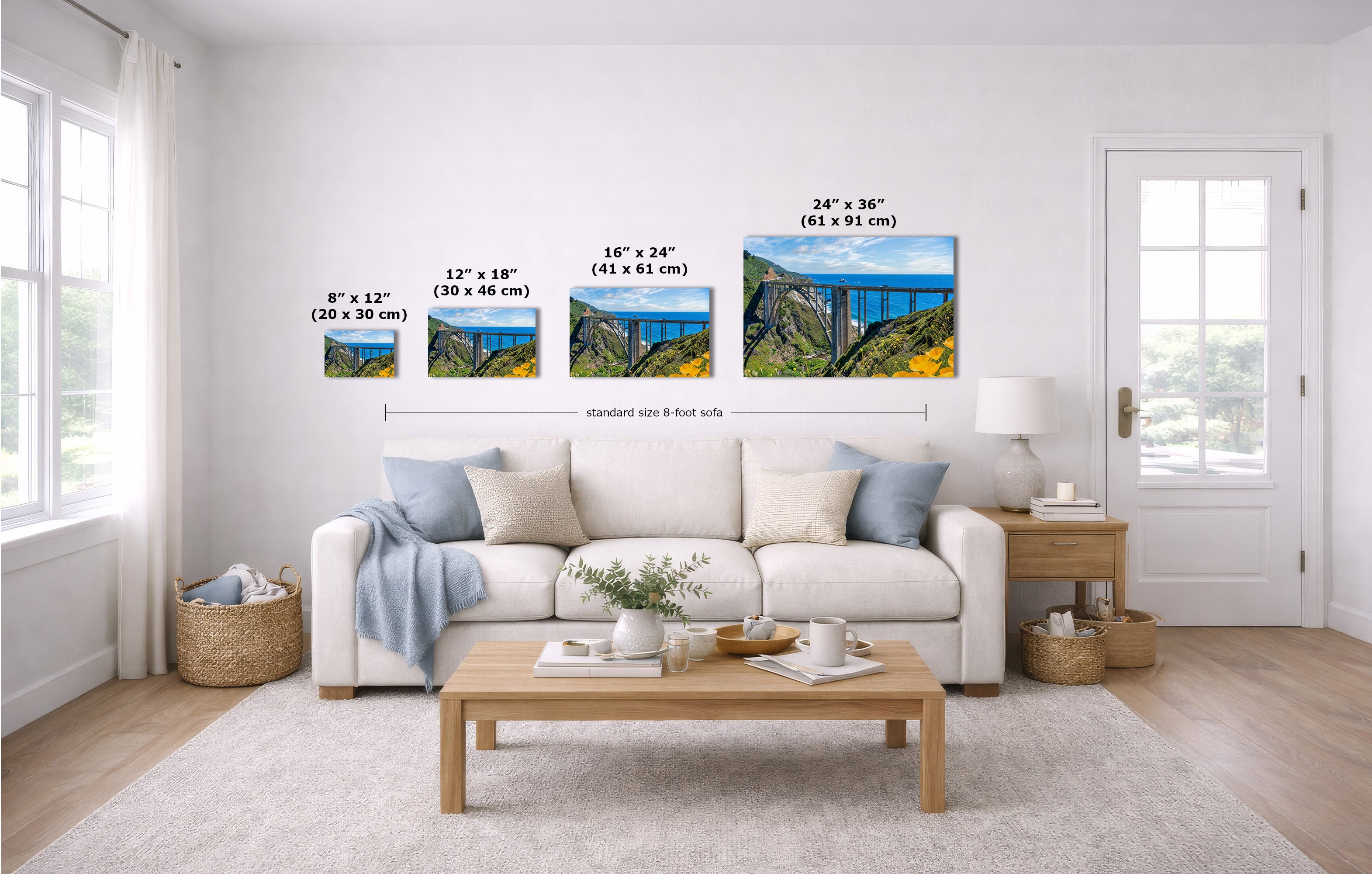 A staged living room shows four wall art prints above a white sofa, each with size text labels. The prints depict a blue sky, green hills, and yellow wildflowers.
