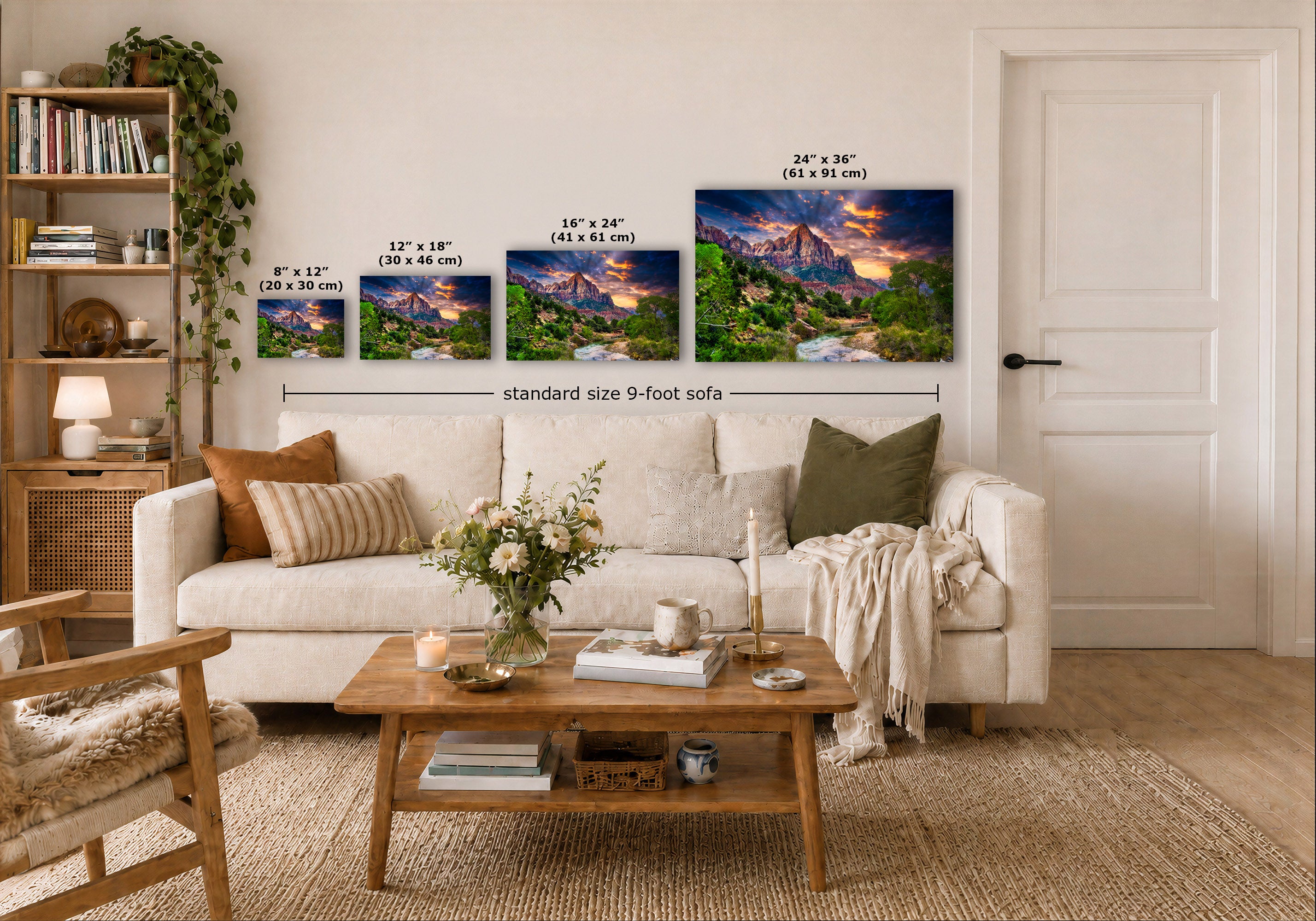 A staged living room shows a white sofa with pillows, a wooden coffee table, shelving, and a door, with four landscape wall art prints above the sofa. The prints include size labels and a dimension line reading standard size 9-foot sofa.