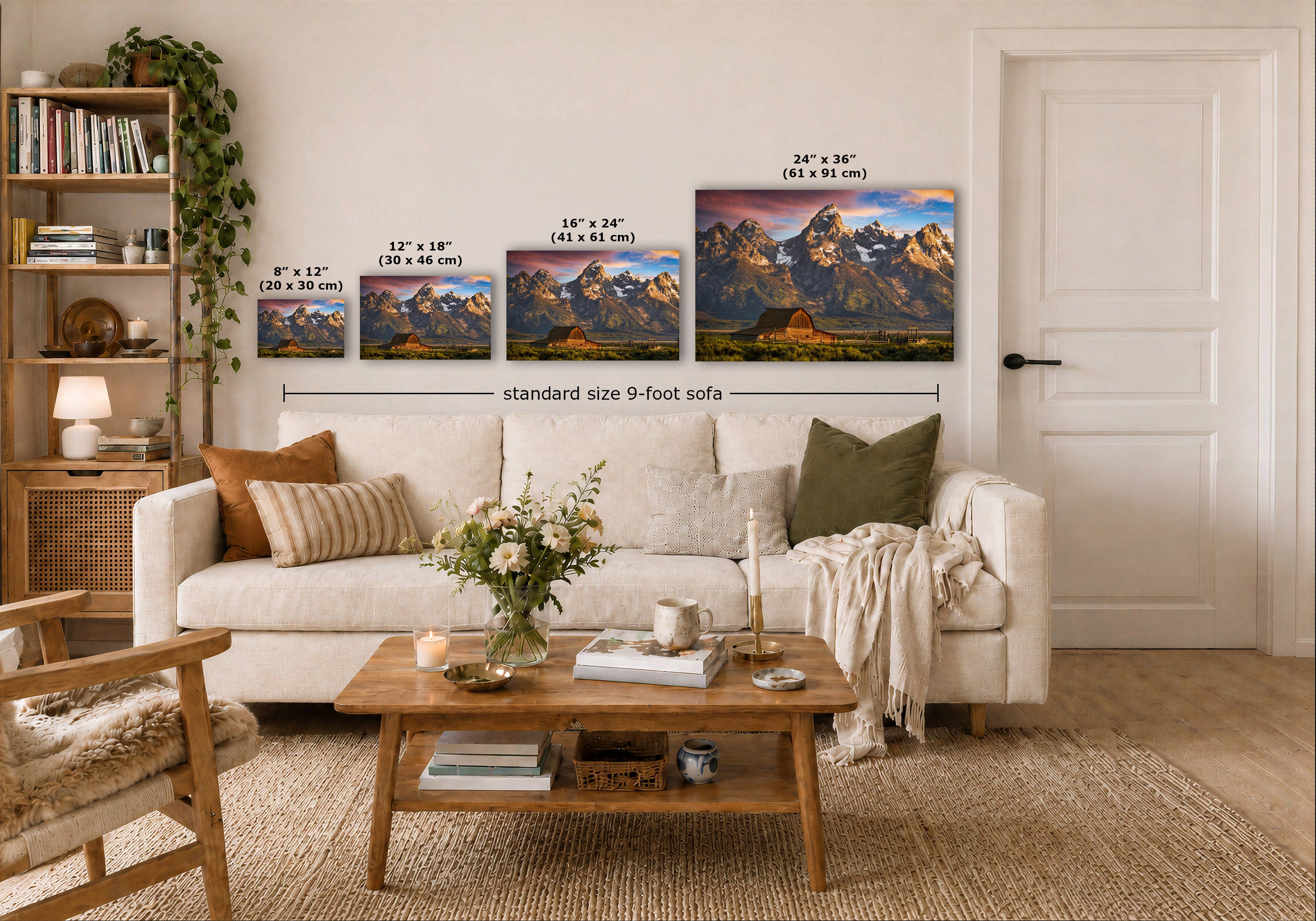 A staged living room shows a white sofa, wooden coffee table, shelving, and a large wall display of four mountain landscape prints with printed size labels and a 'standard size 9-foot sofa' measurement line across them.