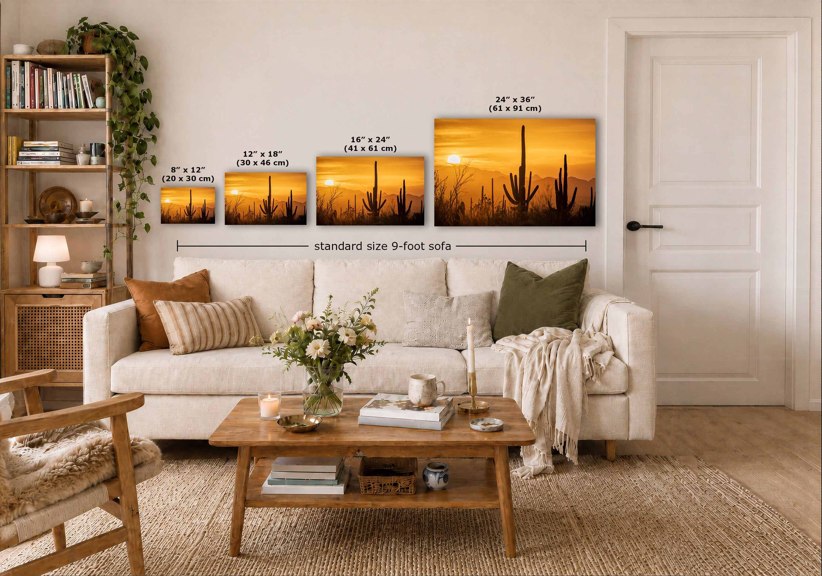A staged living room shows a white sofa, wooden coffee table, shelving, and a wall with four desert cactus prints. White text labels indicate the sizes of the prints and notes 'standard size 9-foot sofa'.
