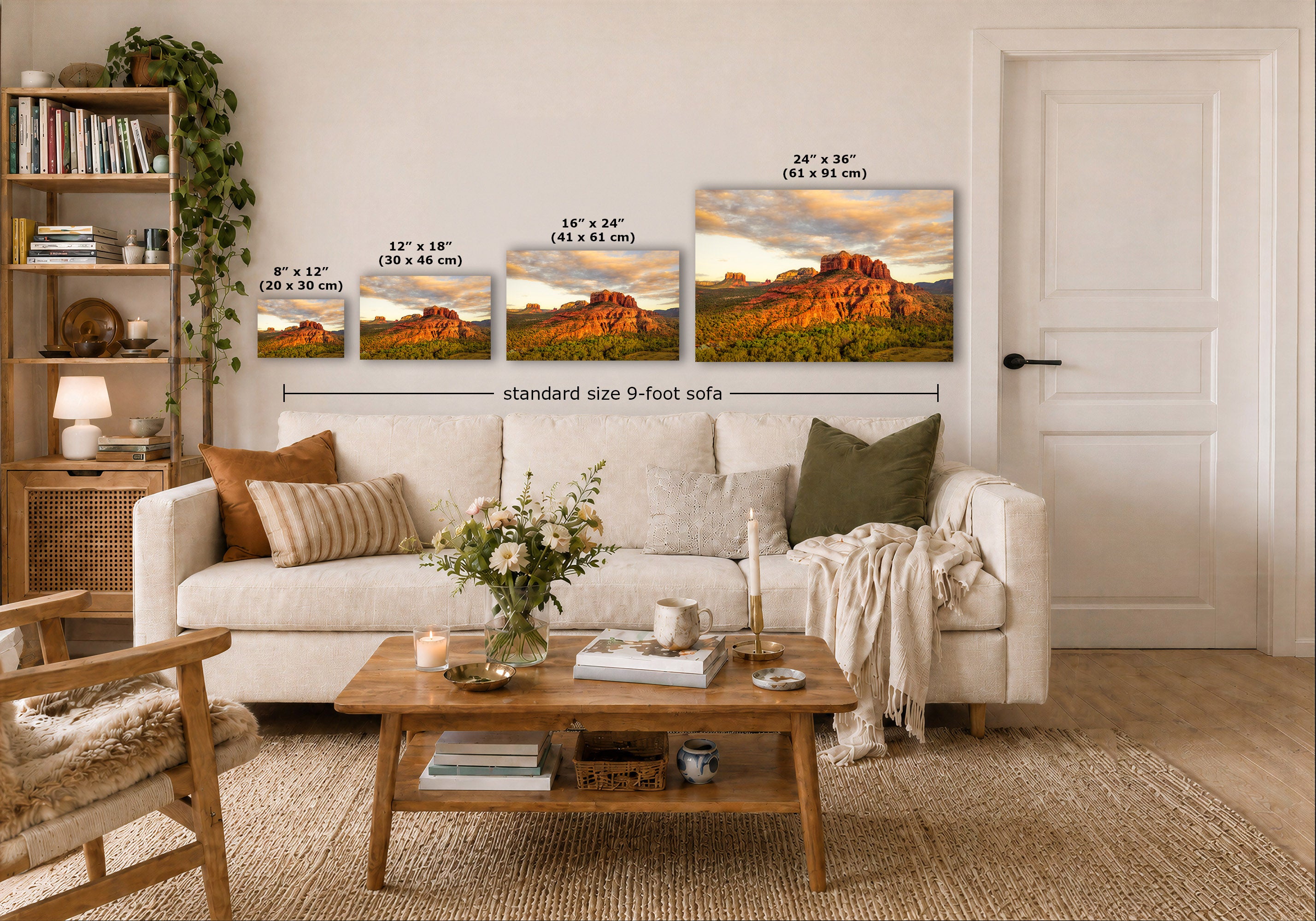 A staged living room shows a white sofa, wooden coffee table, shelving, and a large wall display of four framed desert landscape prints with overlaid size labels and a 'standard size 9-foot sofa' measurement guide.