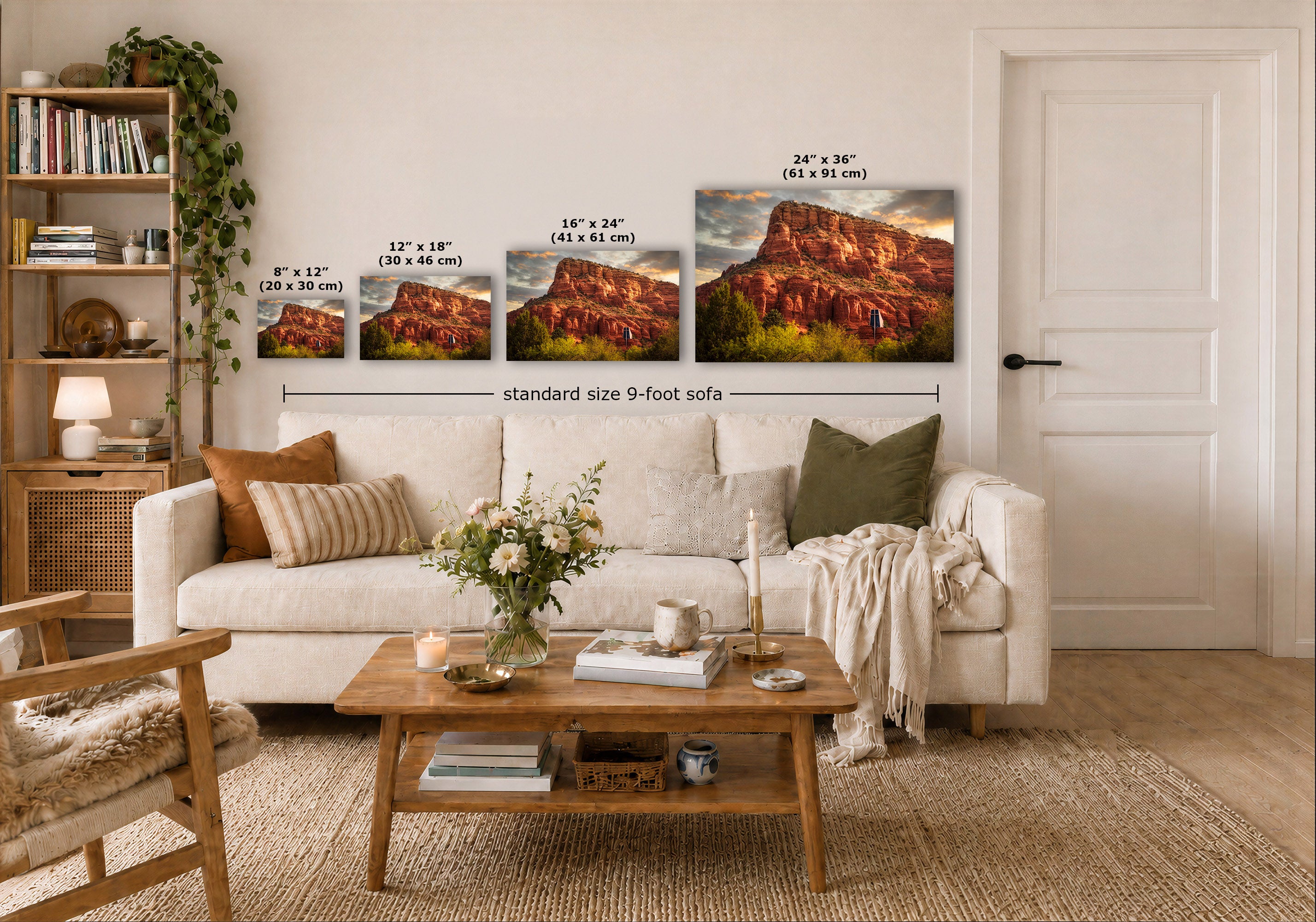 A staged living room shows a white sofa, wooden coffee table, shelving, and a large wall display of four framed landscape prints with printed size labels and a dimension line reading standard size 9-foot sofa.