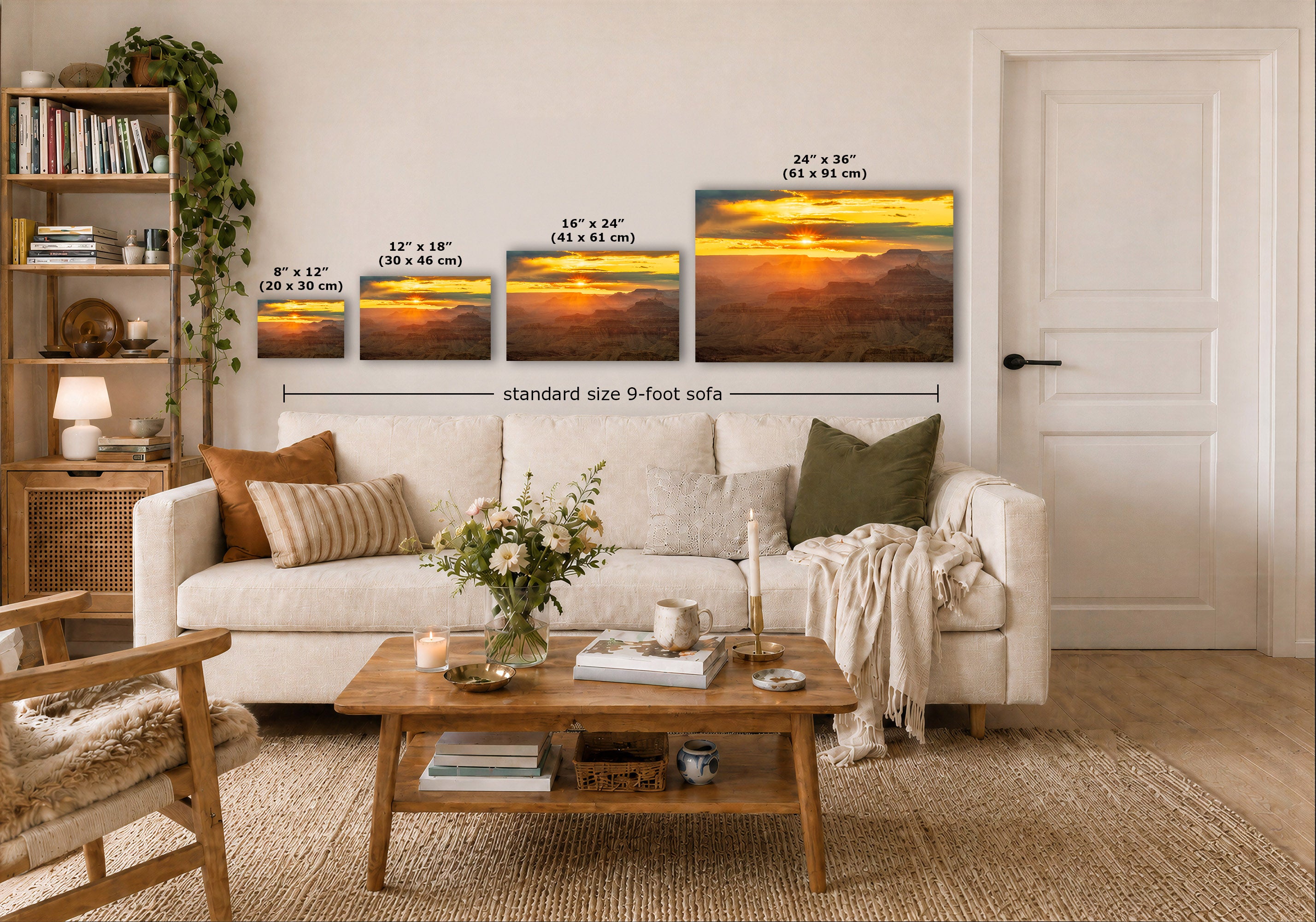 A staged living room shows a white sofa, wooden coffee table, shelving, and a wall with four sunset landscape prints. White text labels indicate the sizes of the prints and notes a 'standard size 9-foot sofa' width.